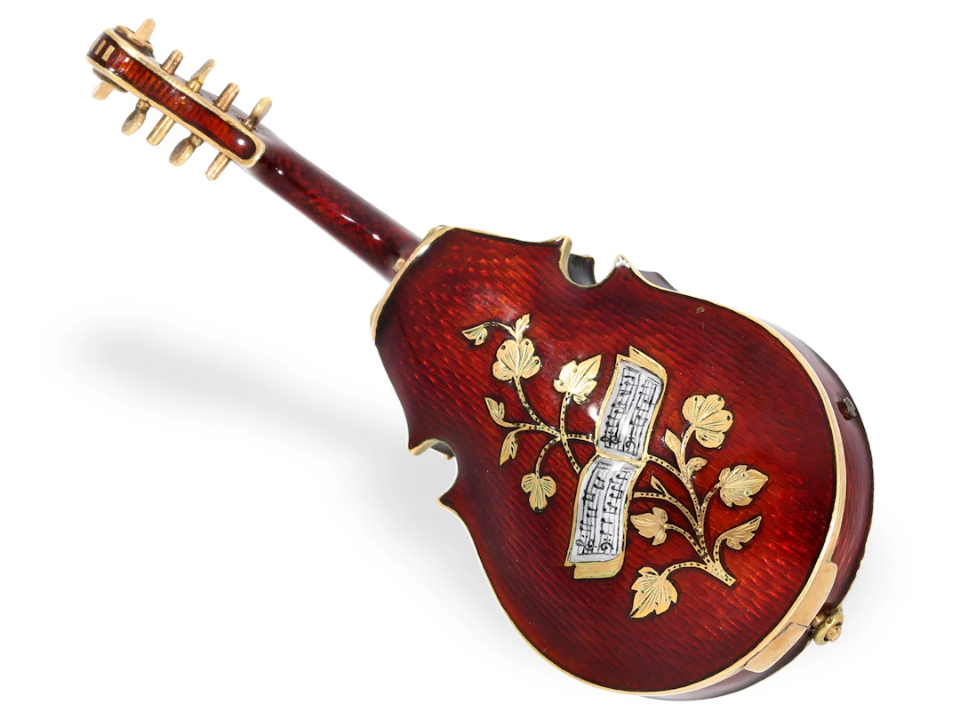 Form watch: a very rare gold and enamel violin with a scent container