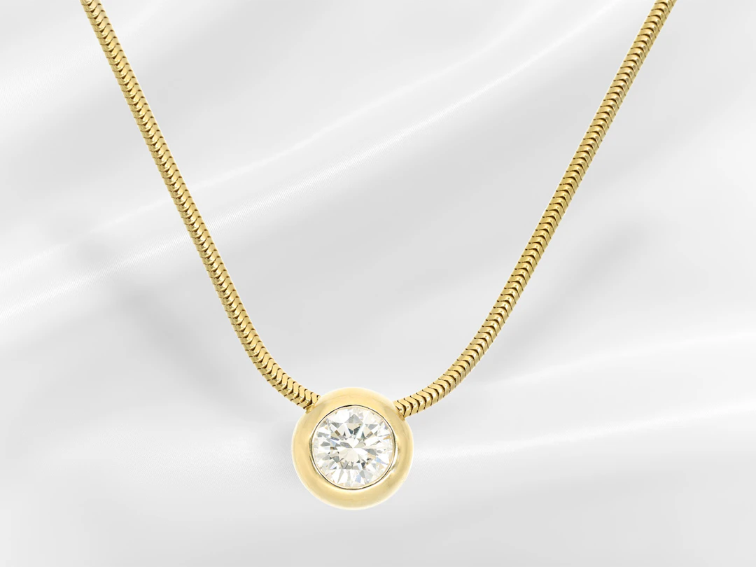 Necklace: delicate gold snake chain with a very high-quality solitaire/brilliant