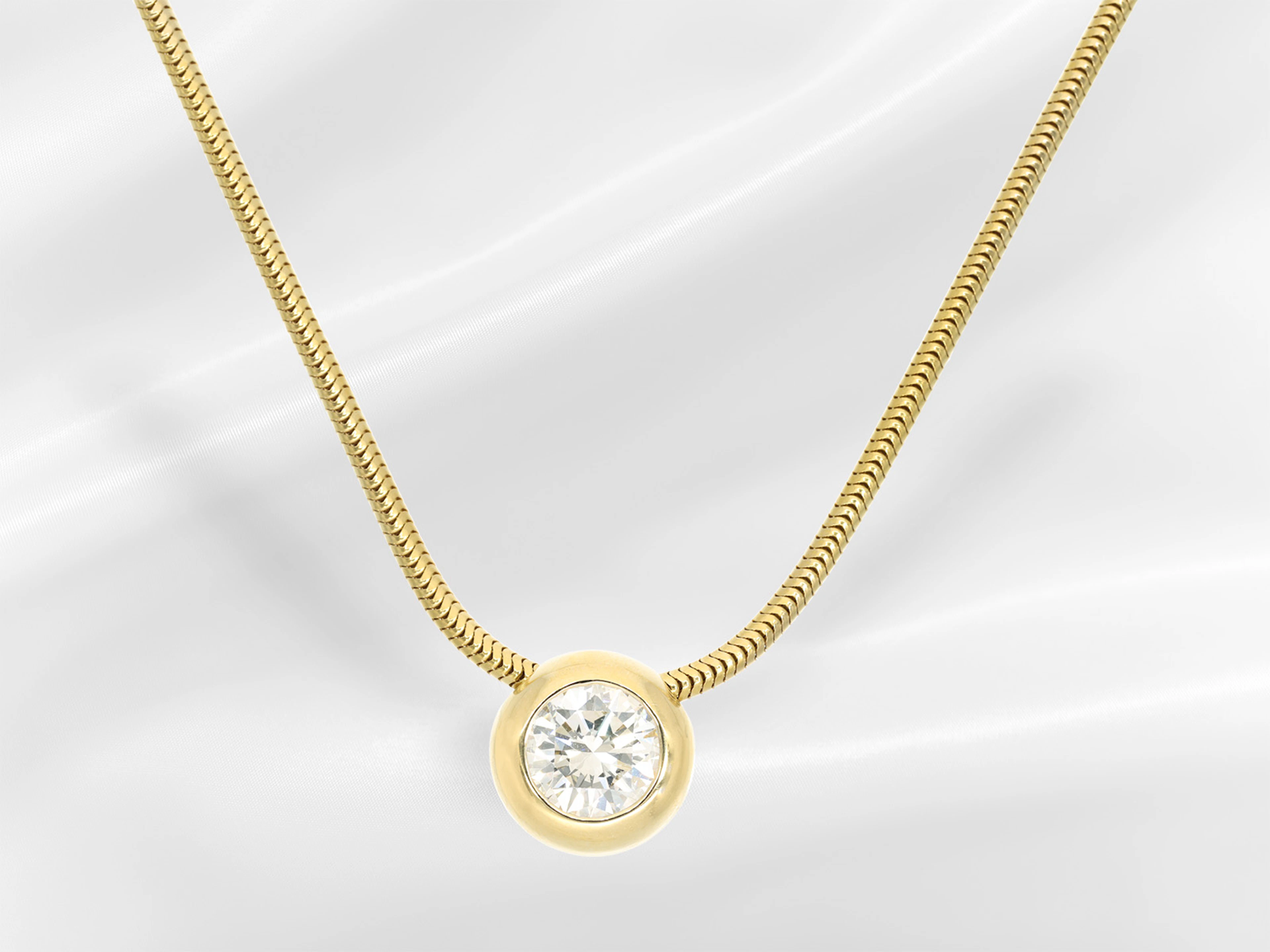 Necklace: delicate gold snake chain with a very high-quality solitaire/brilliant