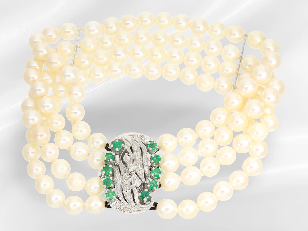 Bracelet: multi-strand vintage pearl bracelet with a white gold emerald