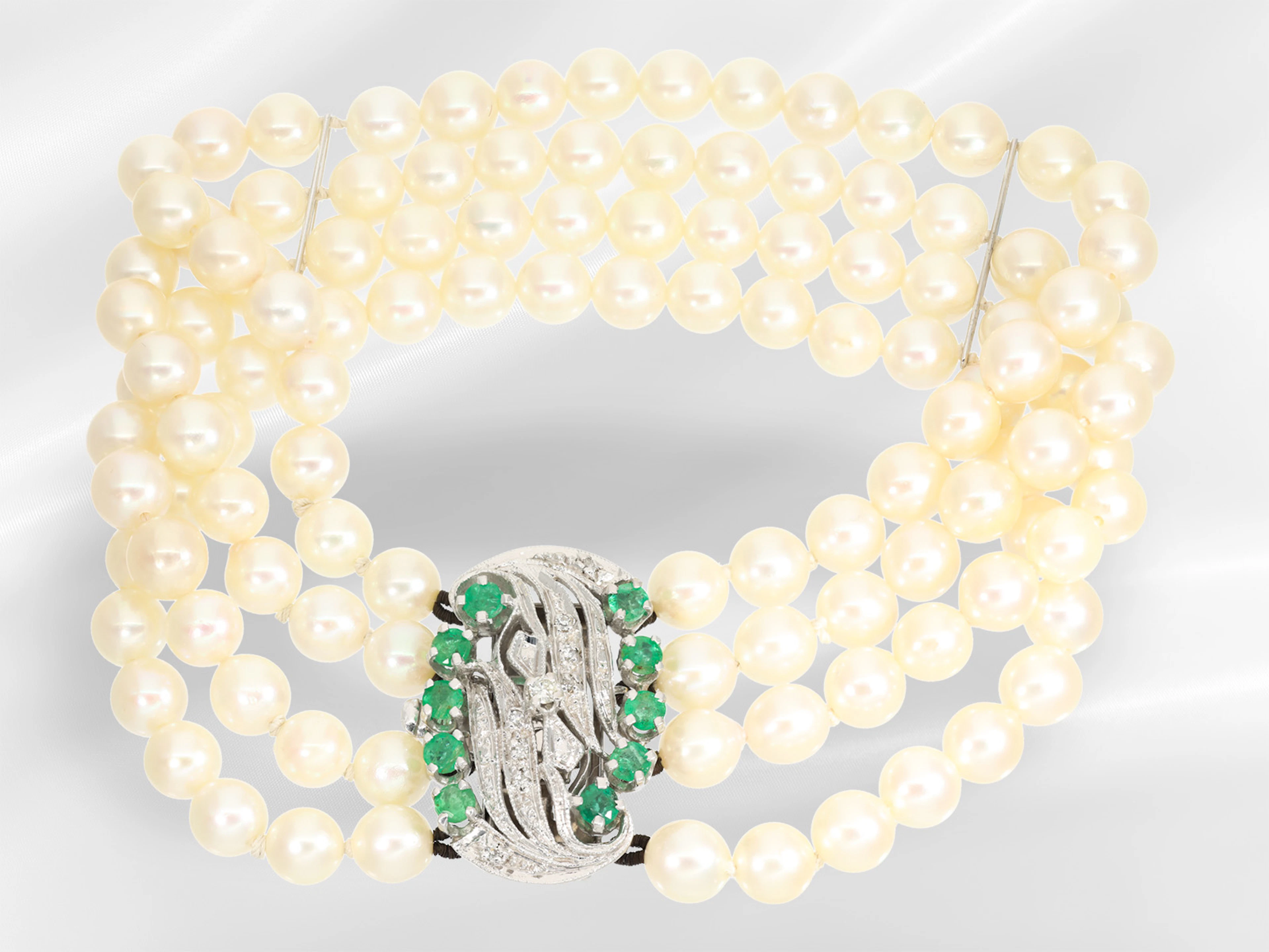 Bracelet: multi-strand vintage pearl bracelet with a white gold emerald