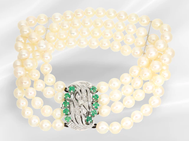 Bracelet: multi-strand vintage pearl bracelet with a white gold emerald