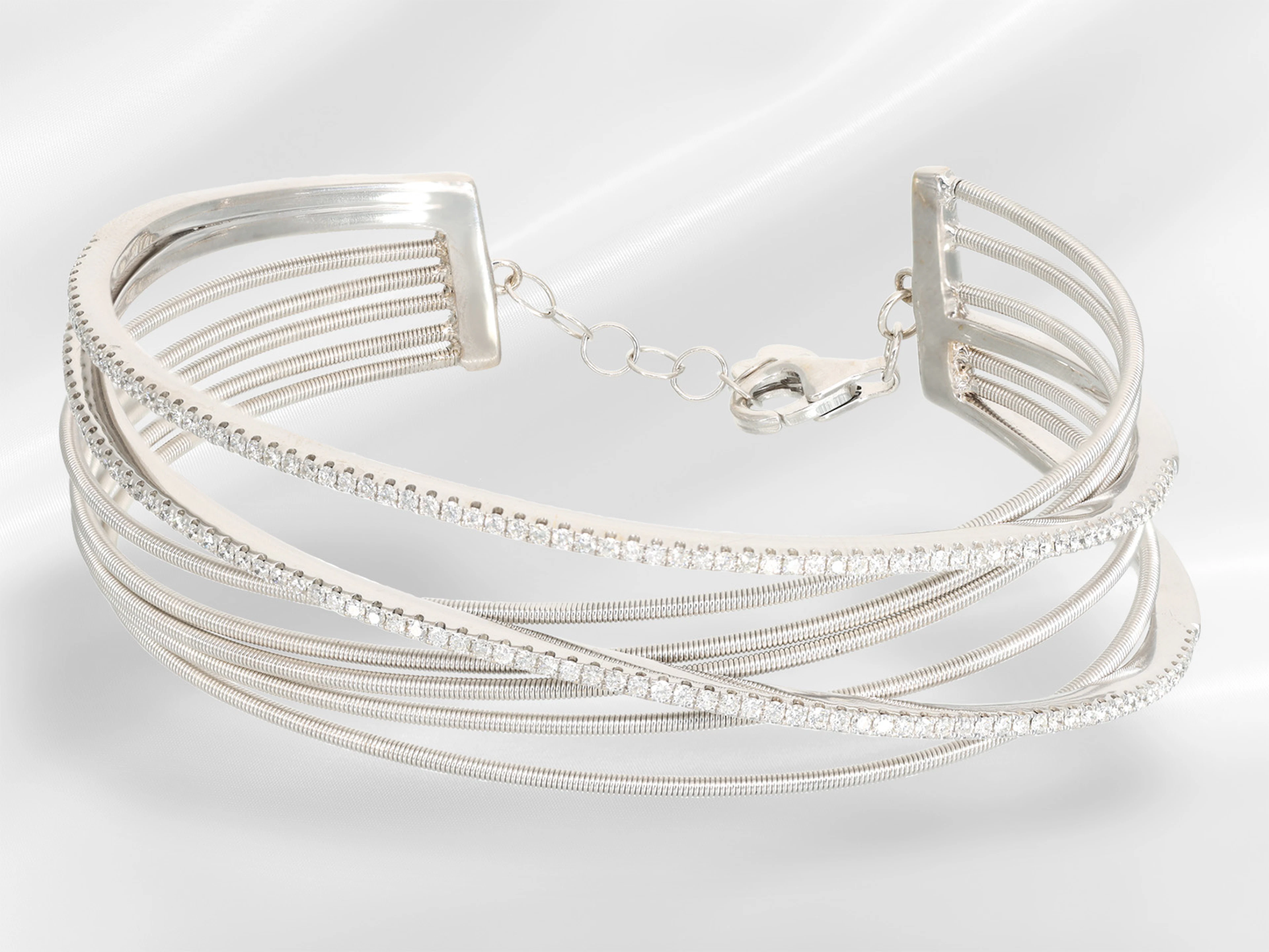 Bangle: unworn white gold designer bangle with brilliant-cut diamonds