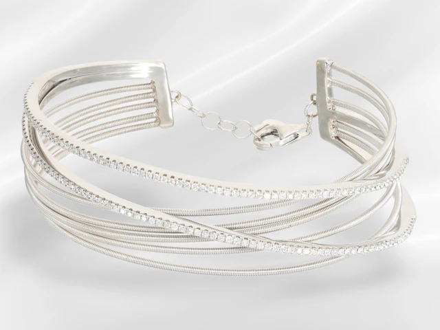 Bangle: unworn white gold designer bangle with brilliant-cut diamonds