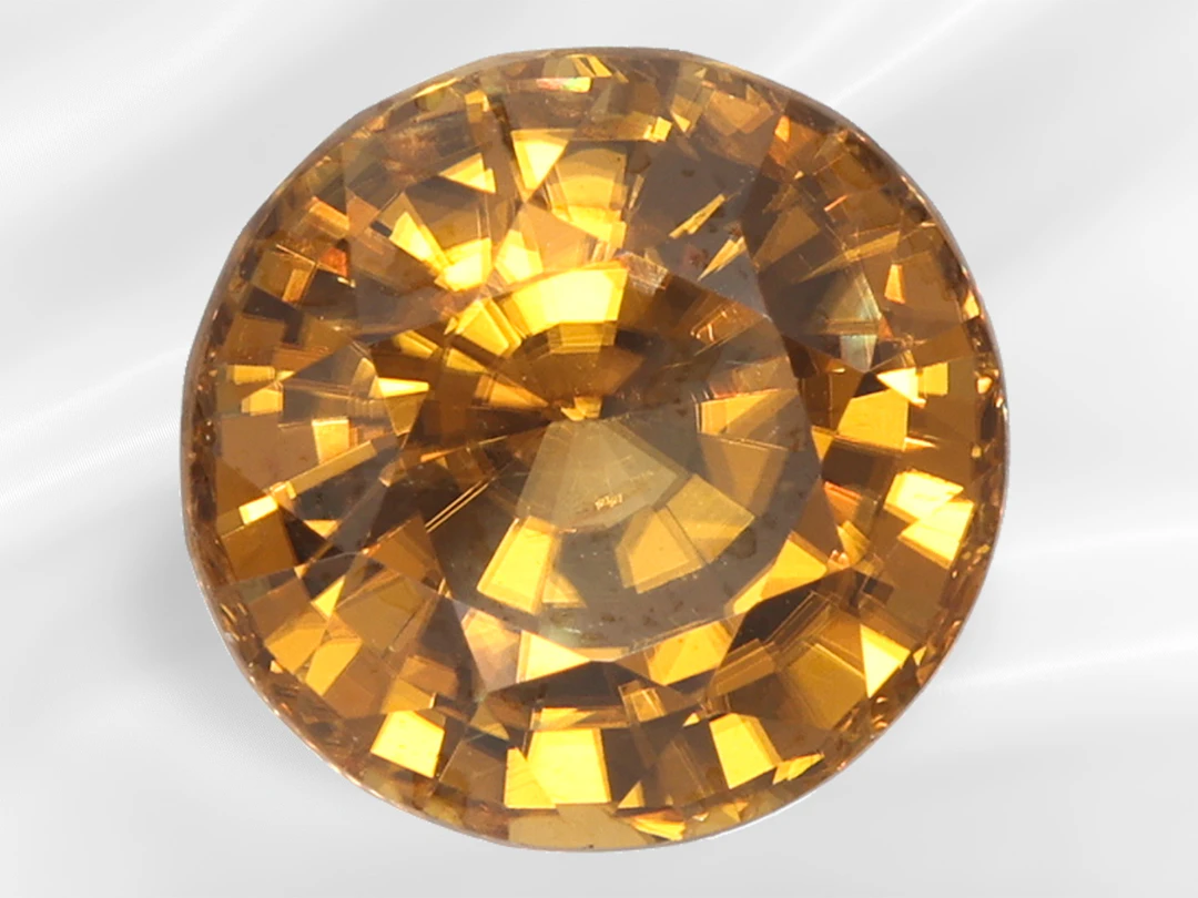 Natural zircon of 4.25 ct in the rare colour ‘Yellowish Brown’, including