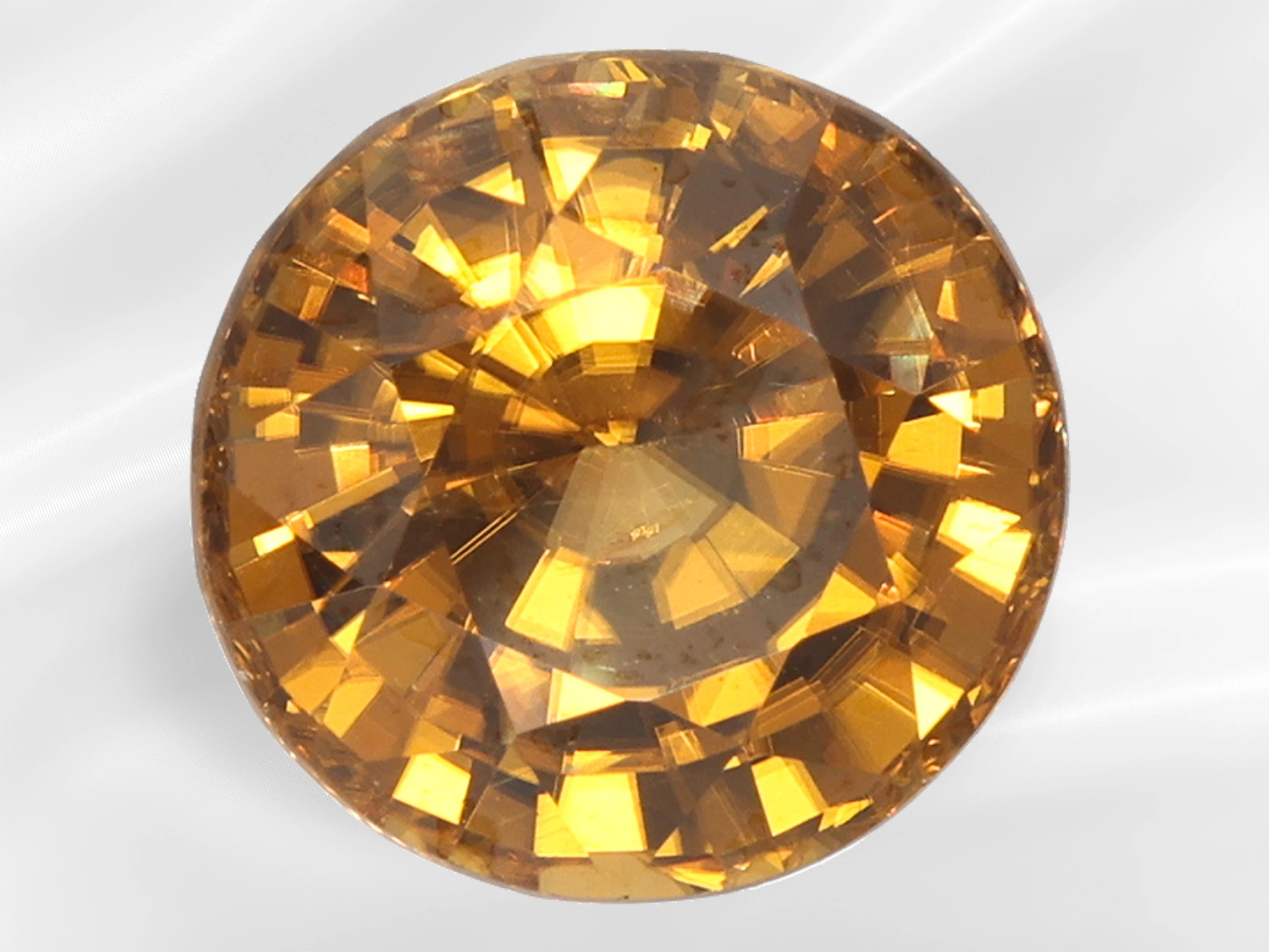 Natural zircon of 4.25 ct in the rare colour ‘Yellowish Brown’, including