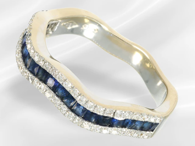 Ring: Italian, wave-shaped goldsmith's ring set with sapphires and