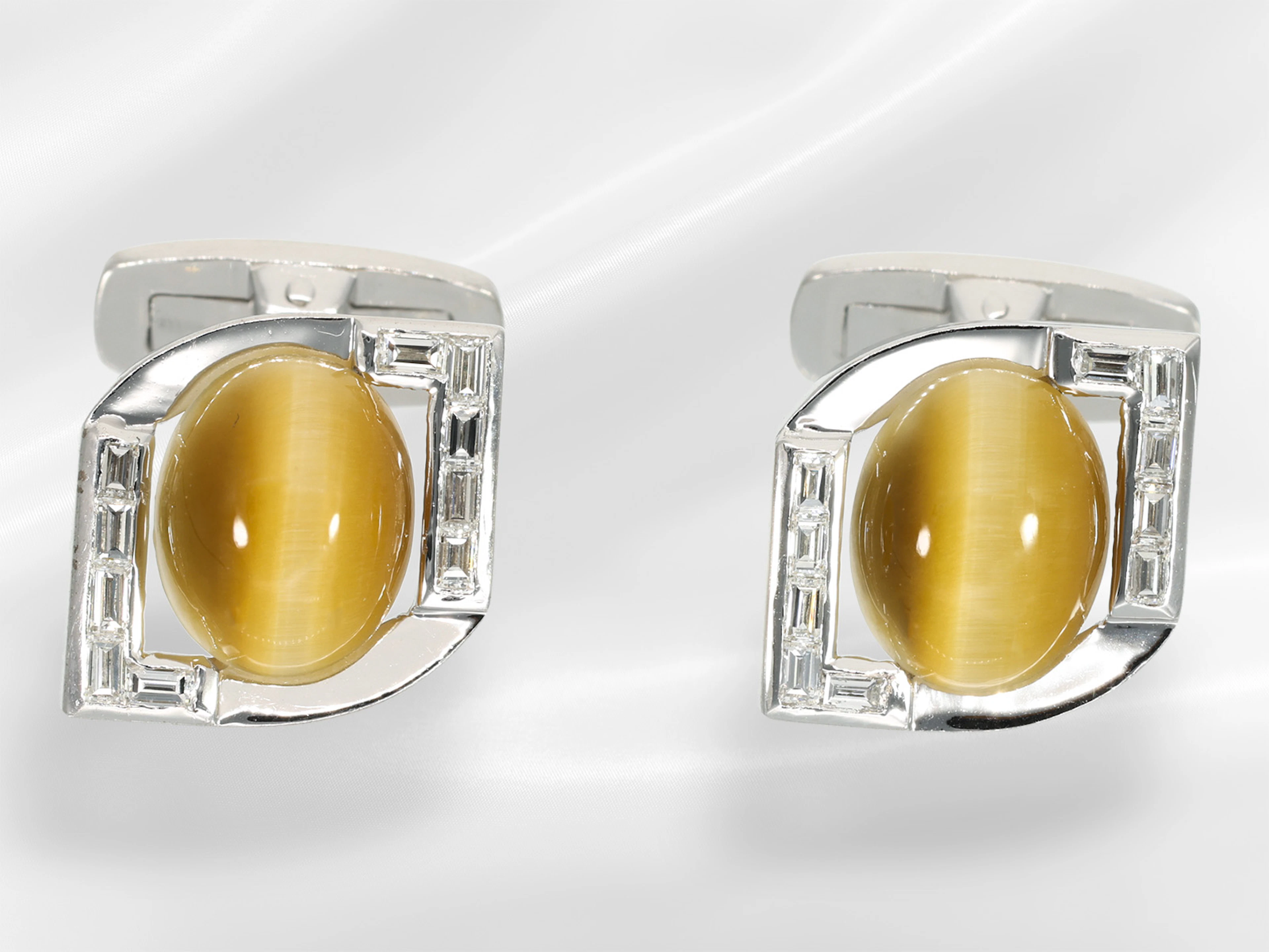 Cufflinks: very interesting goldsmith's work featuring cat’s-eye and diamonds