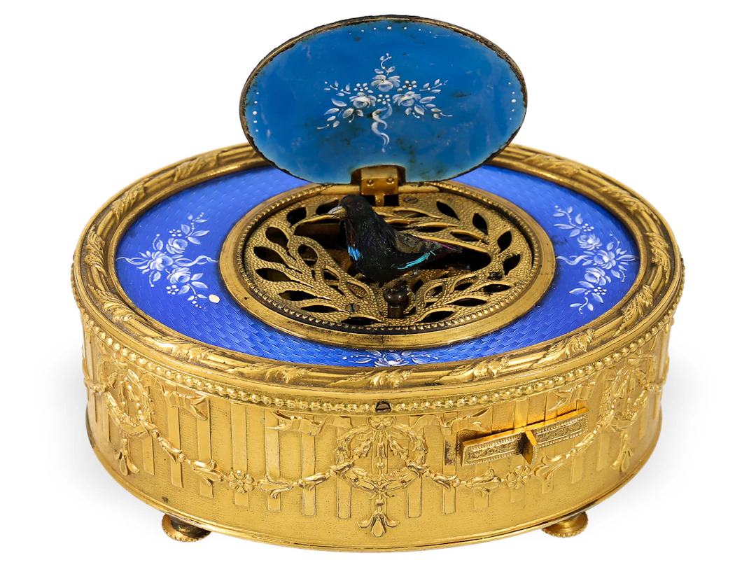 A stunningly beautiful singing bird box with guilloché enamel, probably