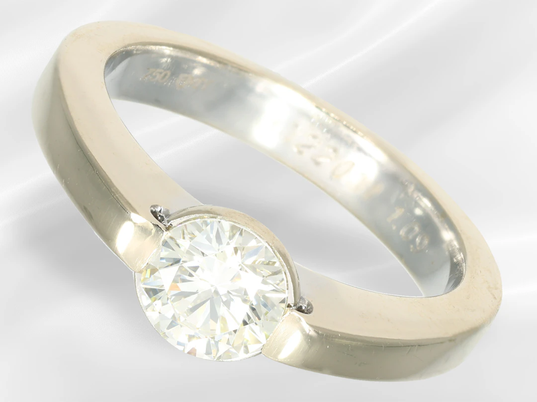 Ring: modern solitaire/brilliant-cut diamond goldsmith's ring, flawless
