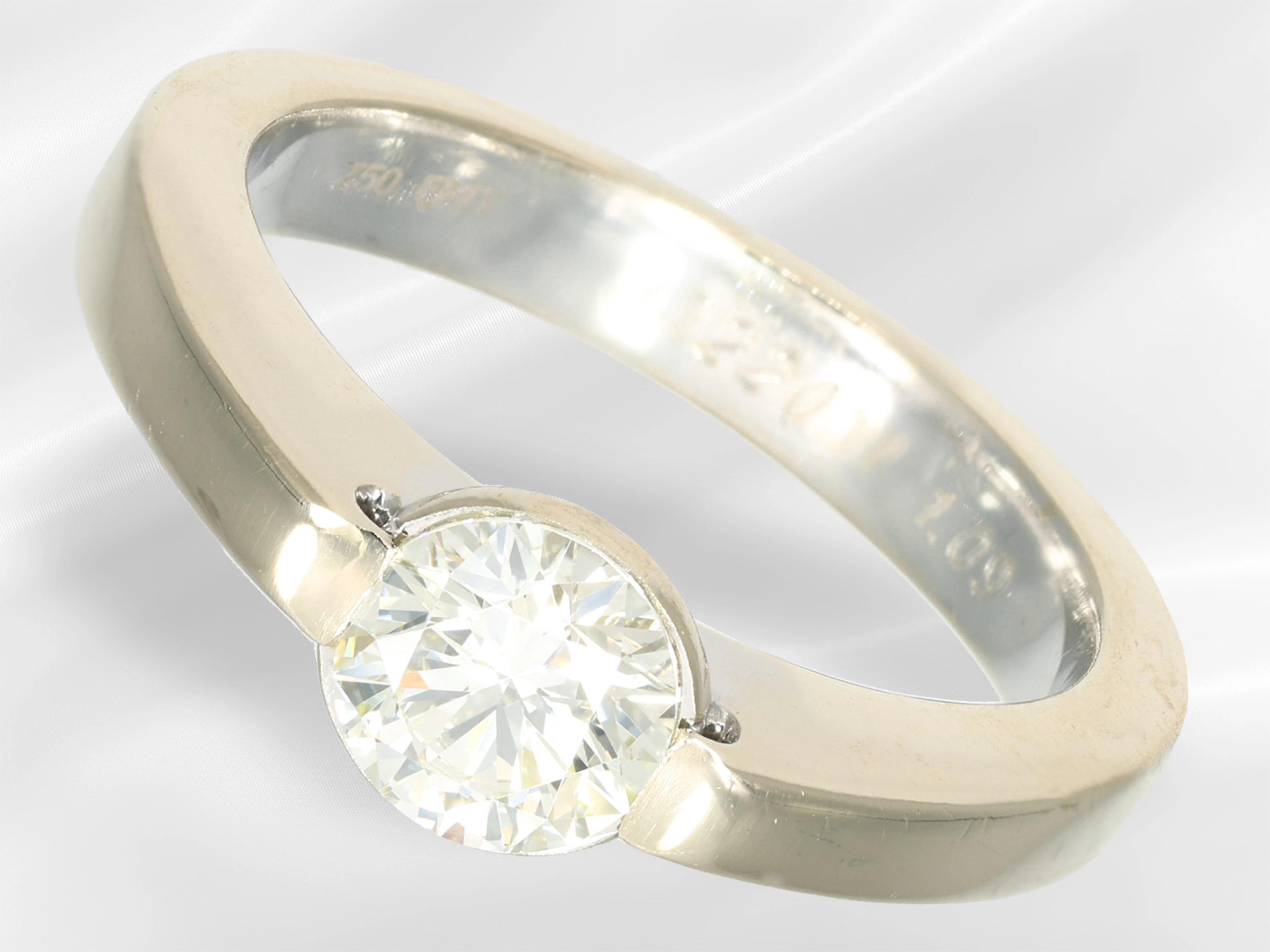 Ring: modern solitaire/brilliant-cut diamond goldsmith's ring, flawless