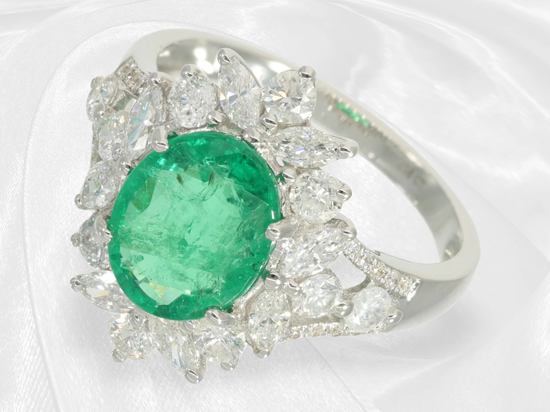 Ring: exquisite emerald and brilliant-cut diamond floret ring by a