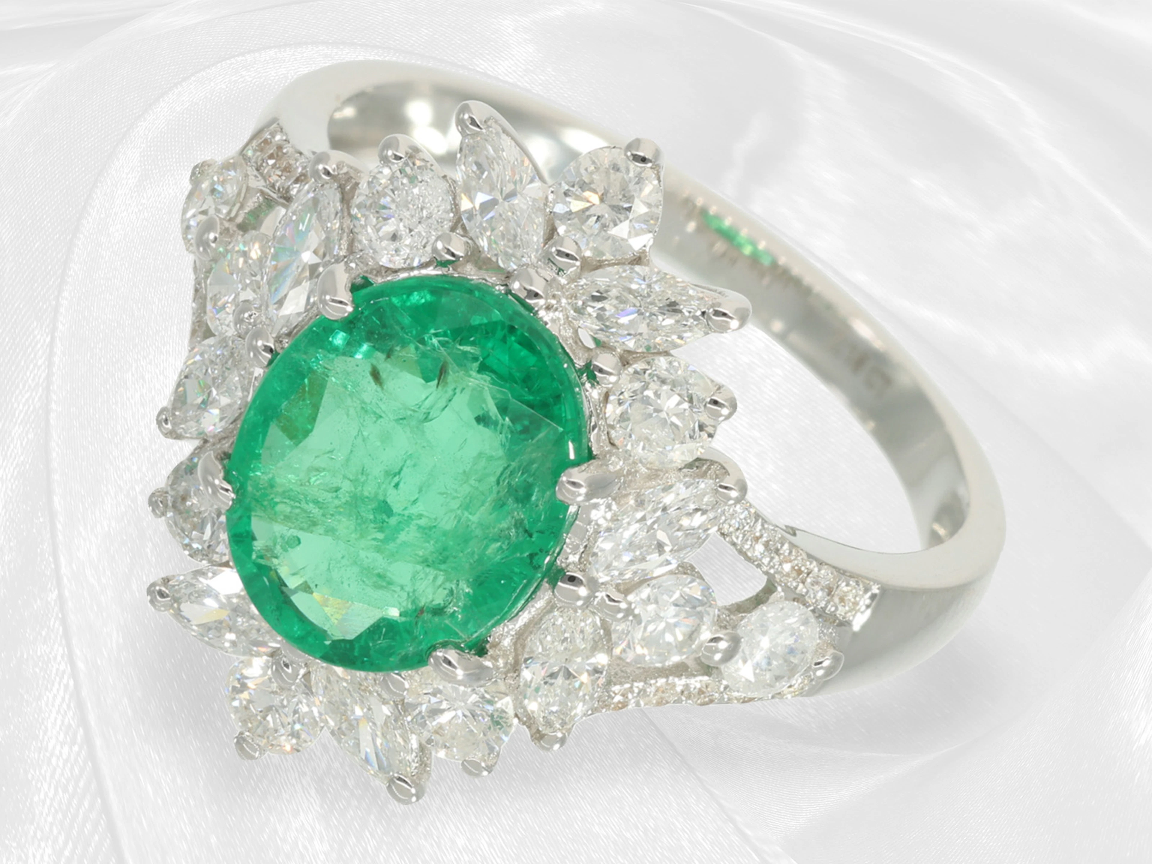 Ring: exquisite emerald and brilliant-cut diamond floret ring by a