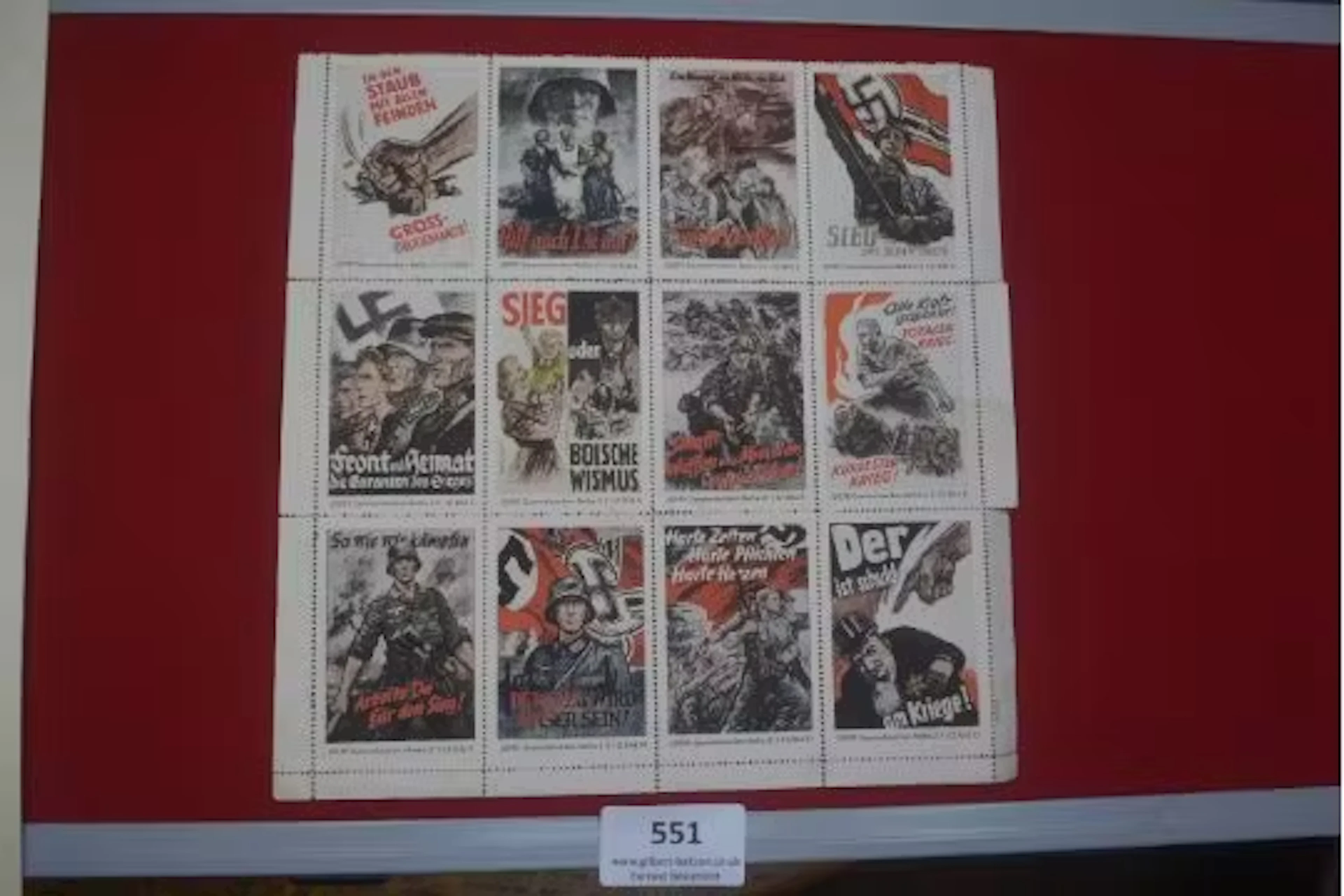 Sheet of twelve WHW/JDFF propaganda poster miniature stamp badges