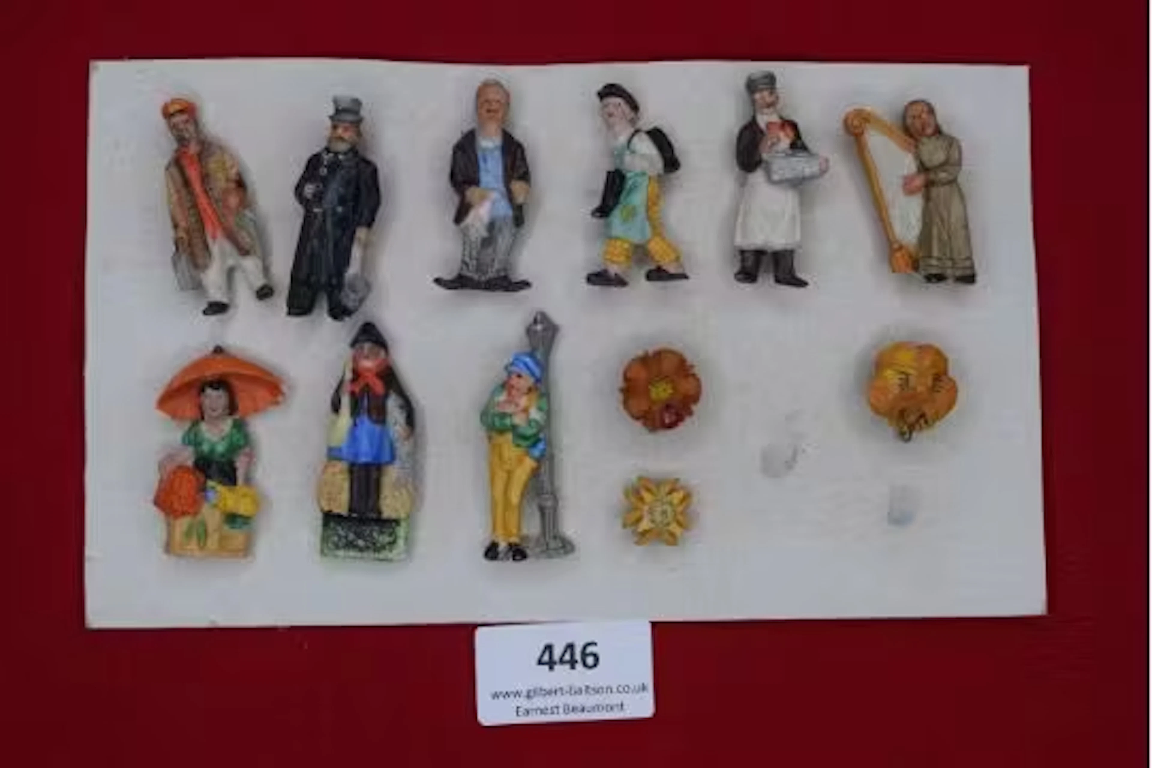 A German WWII WHW set of miniature porcelain figures, townsfolk and