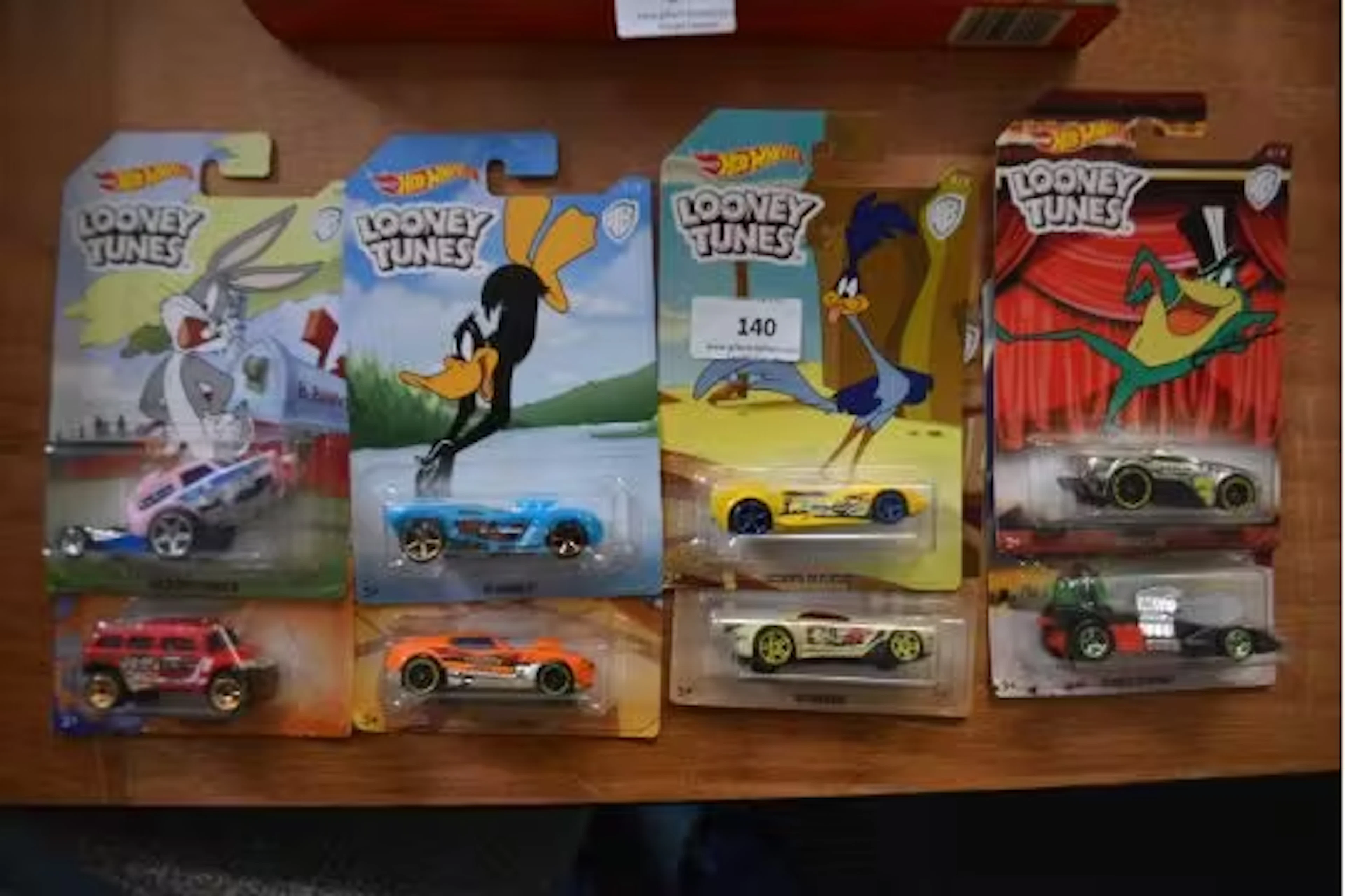 Eight hotwheels Looney tunes classic cars