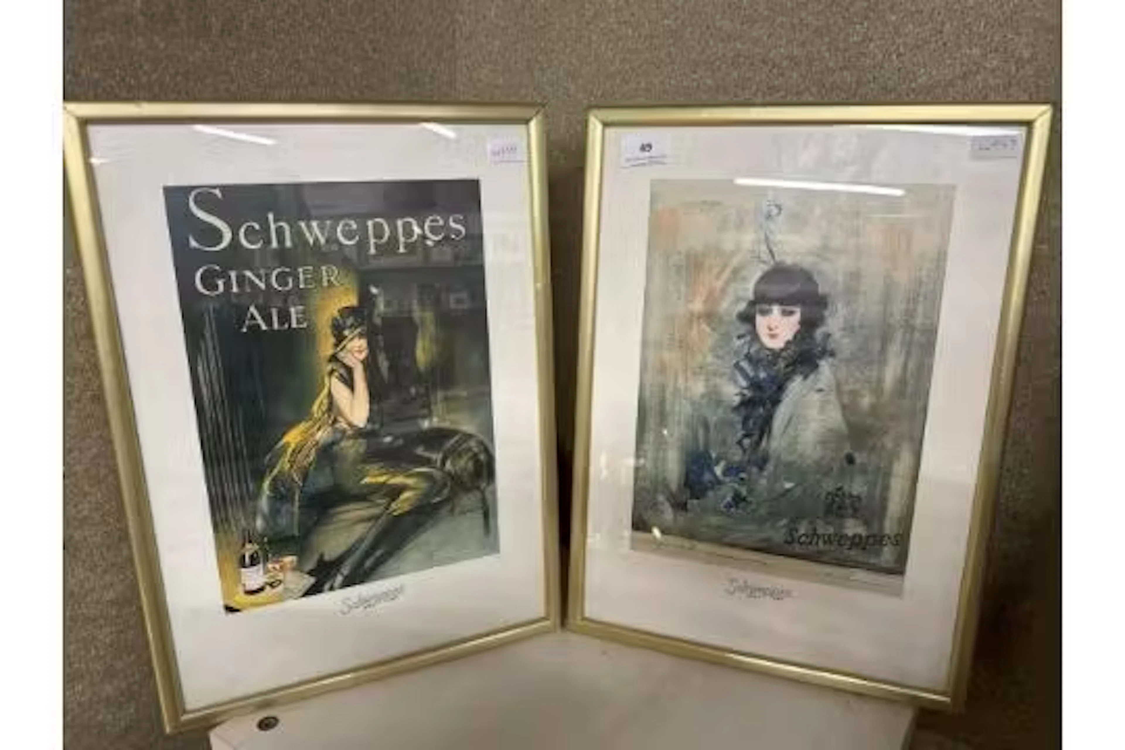 2 framed vintage Schweppes posters