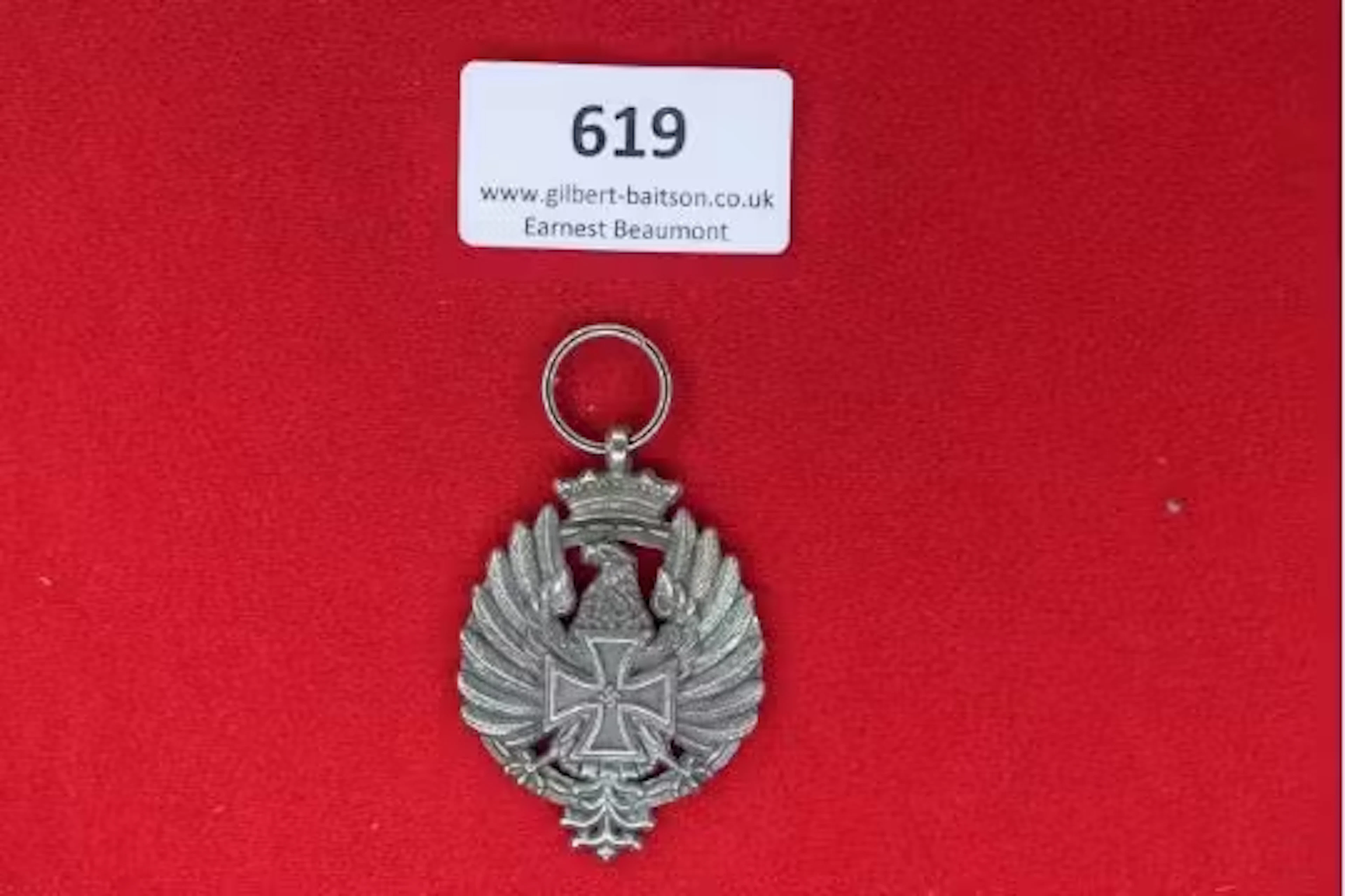 Imperial German Eagle Medal – A silvered medal featuring a crowned
