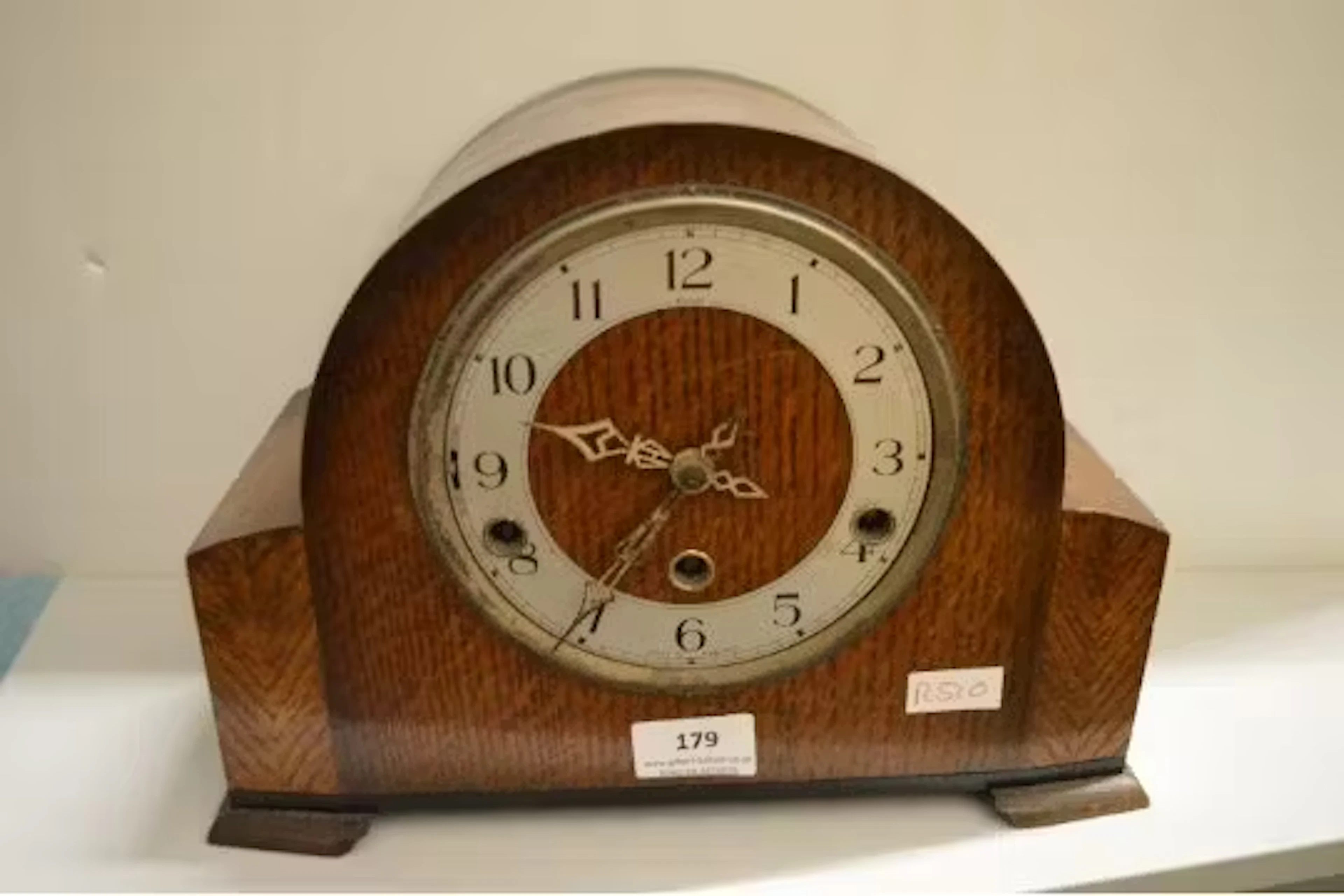 1930's oak cased mantel clock (missing glass)