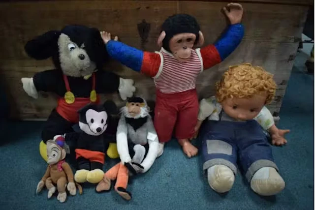 Vintage Soft Toys Including Monkeys, Mickey Mouse, and a Doll