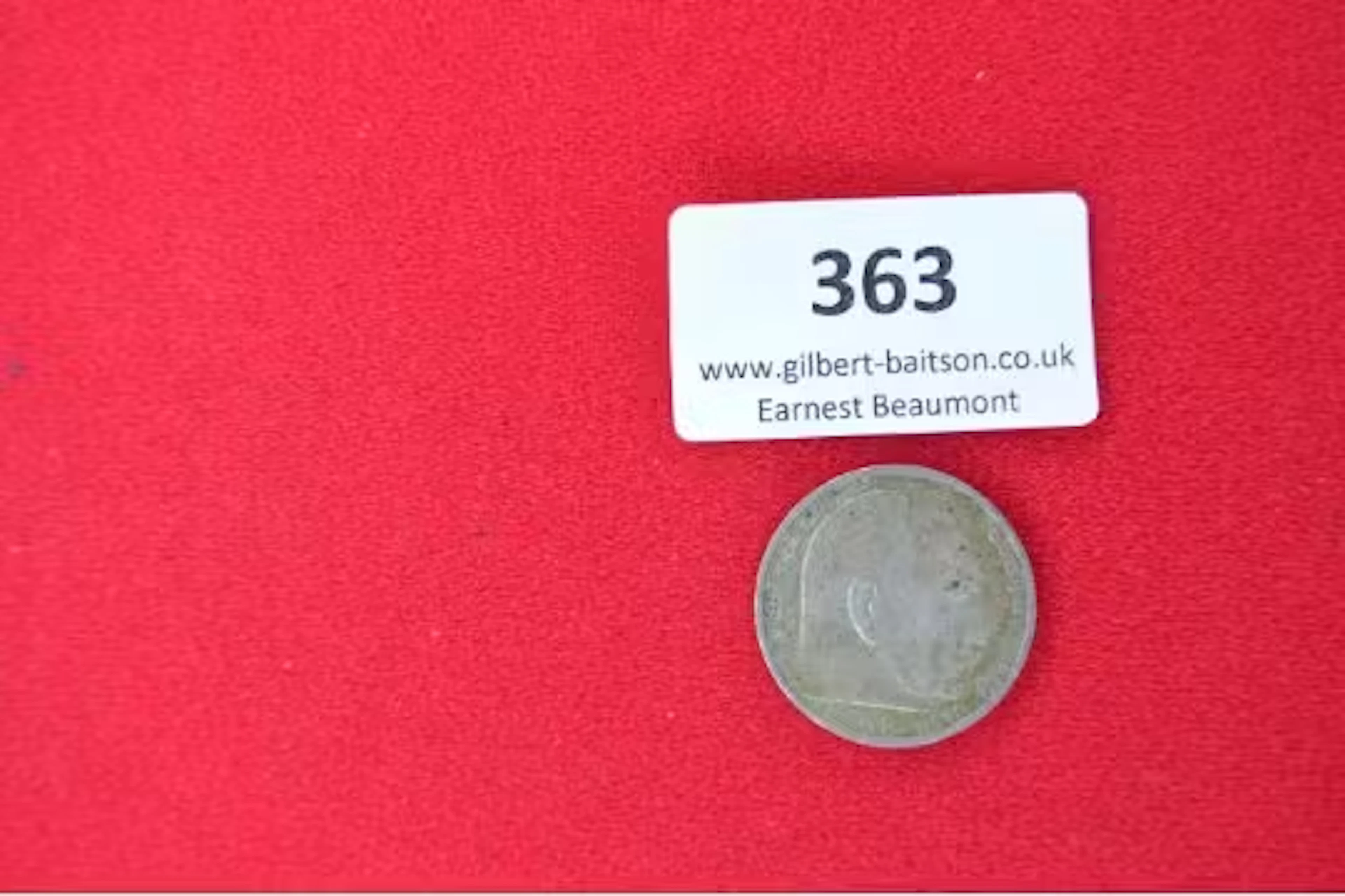 2 Reichsmark Coin – A silver coin dated 1938, featuring bust of Hindenburg