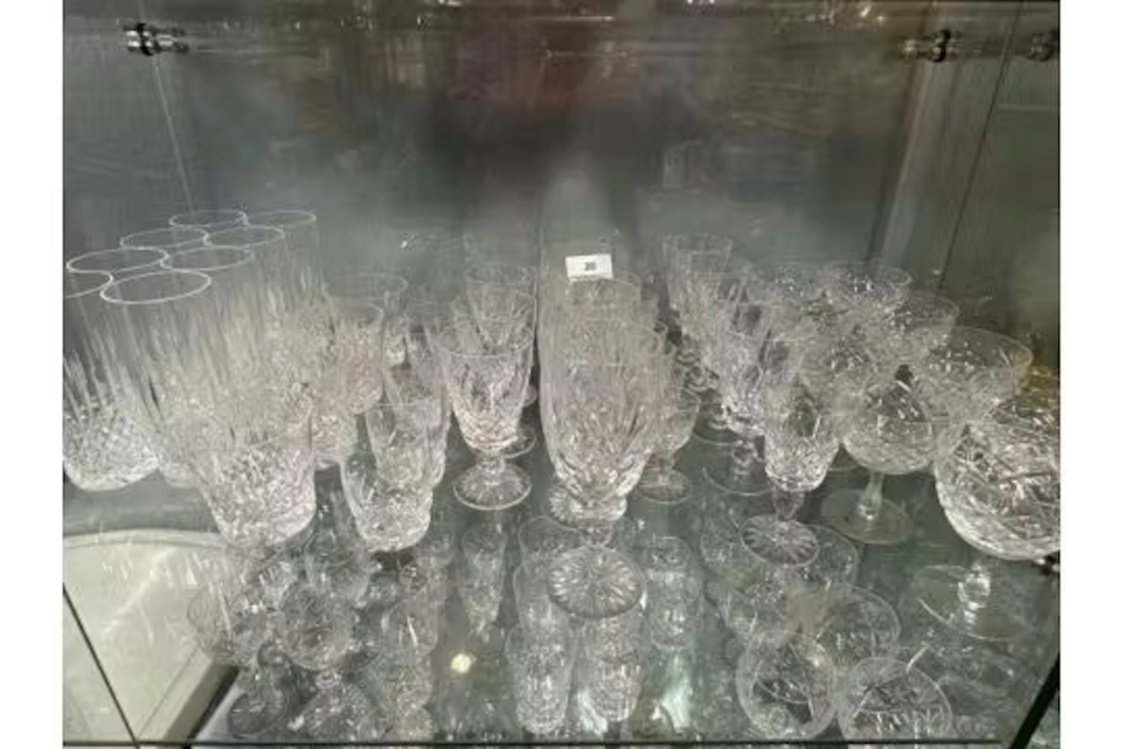 Quantity of cut crystal glasses - matching set