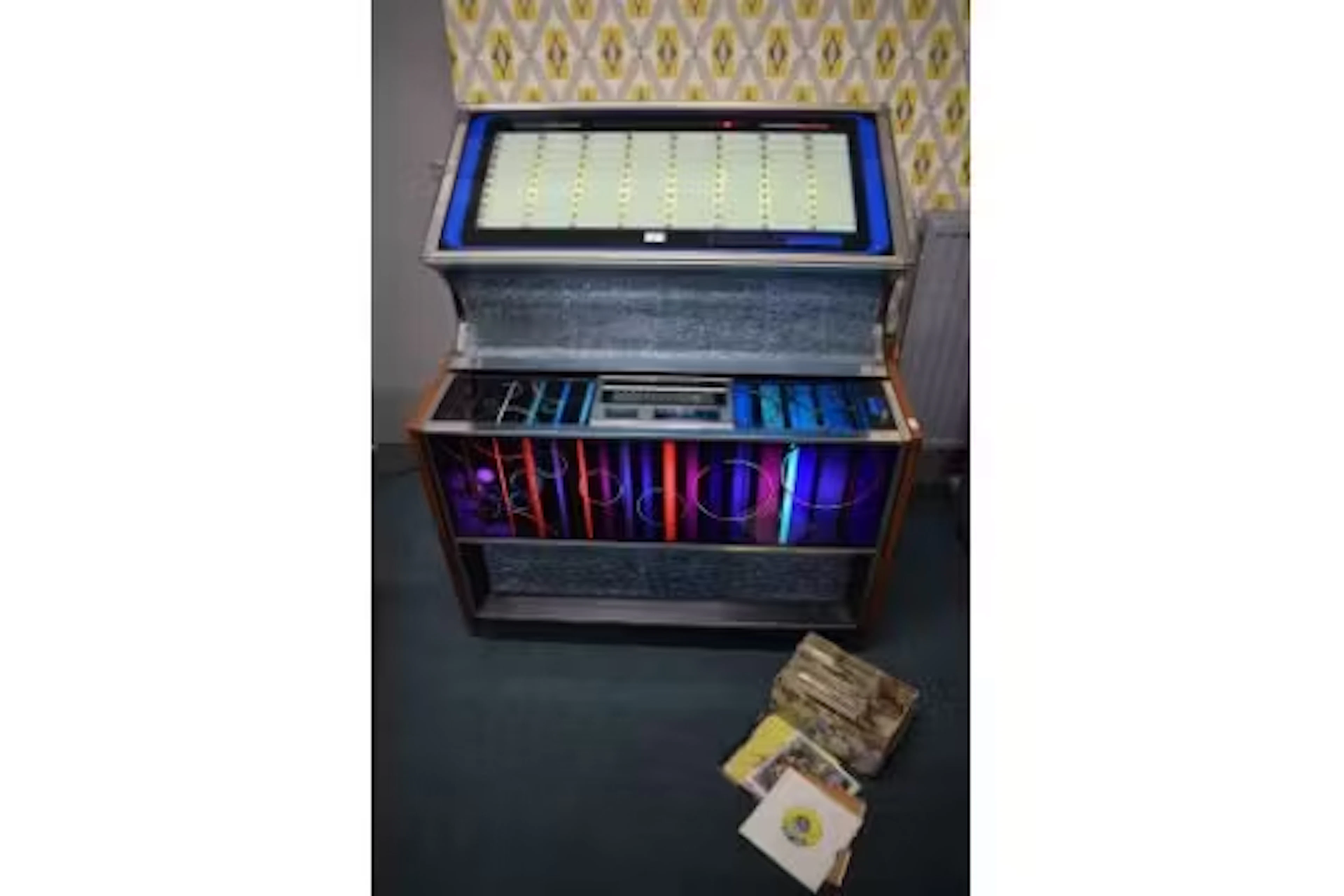 Rock-Ola 448 Jukebox in Working Condition with Collection of Records