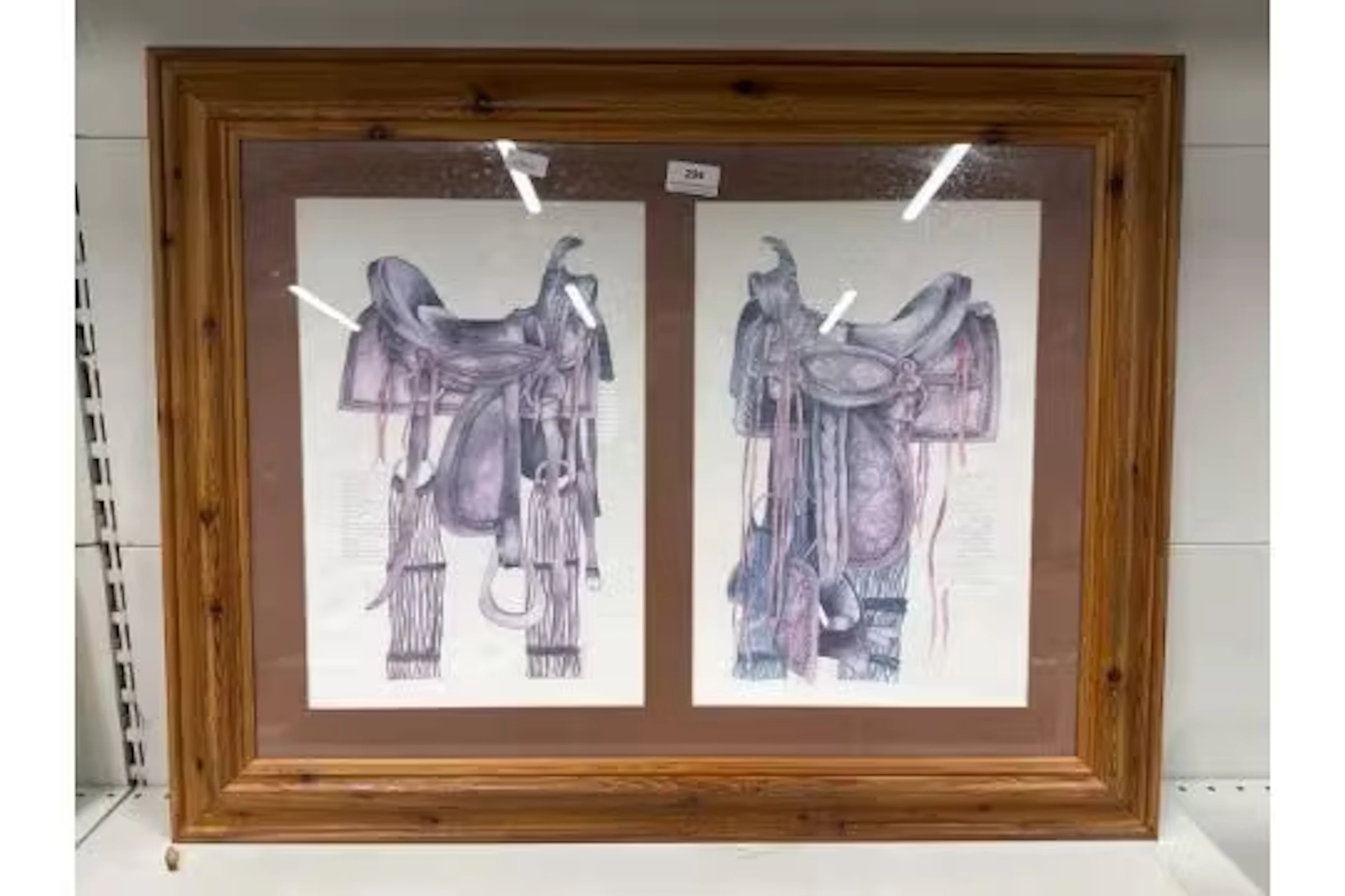Pine framed print of western horse saddles