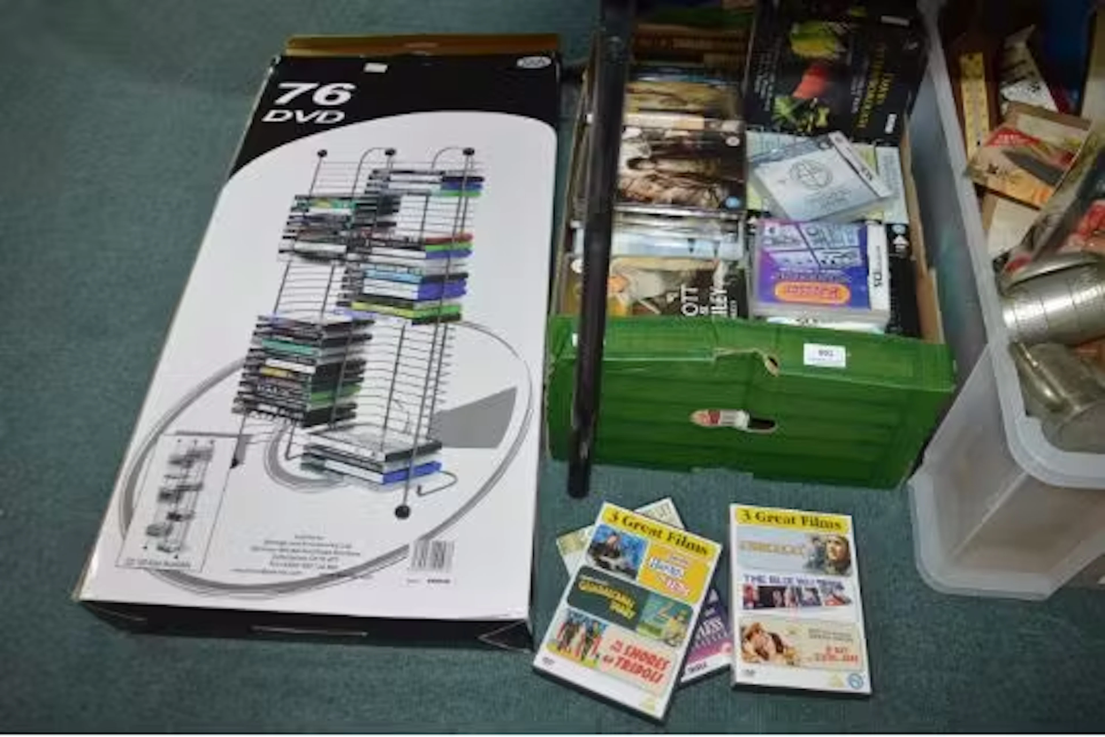 DVDs Including Boxsets, Nintendo DS Games, and a DVD Storage Tower