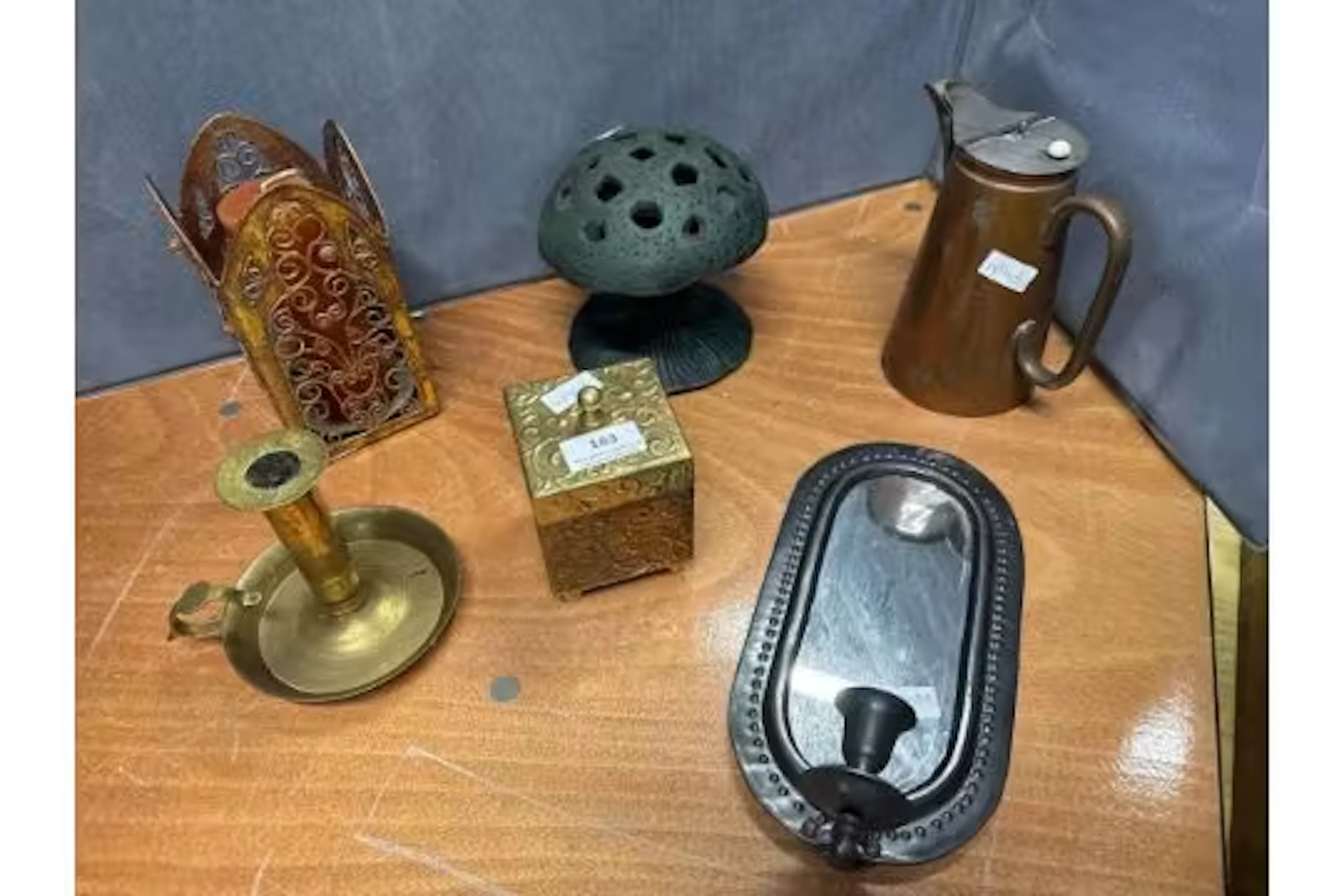 A selection of metal homewares including candle holders, trinket box, jug, etc