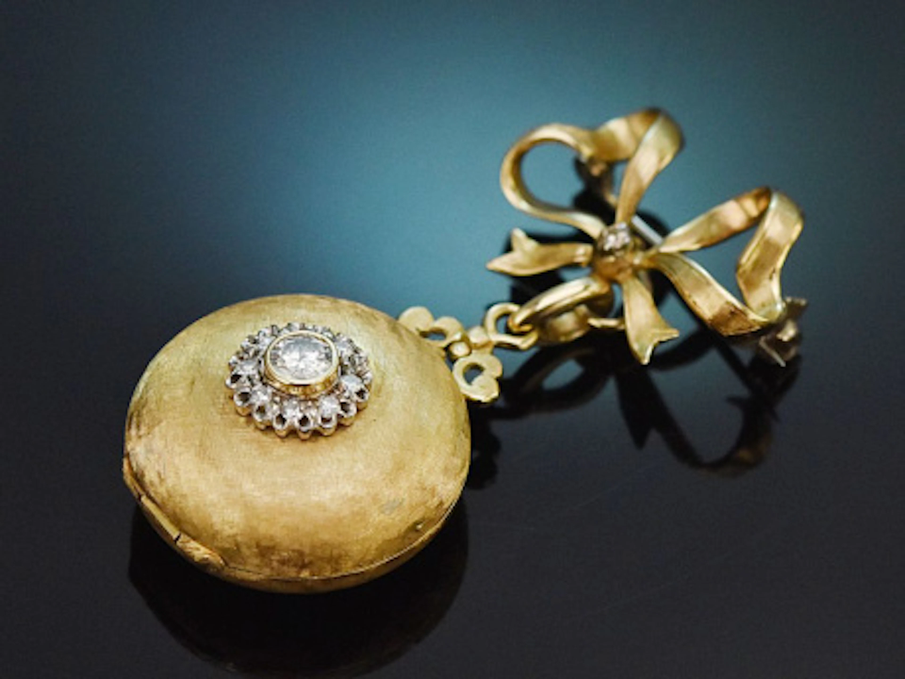 Um 1955! Schleifen-Brosche mit abnehmbarem Doppel Medaillon Diamanten Gold 585