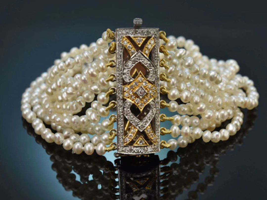 Pforzheim um 1985! Edles 9reihiges Saatperlen Armband mit Diamanten