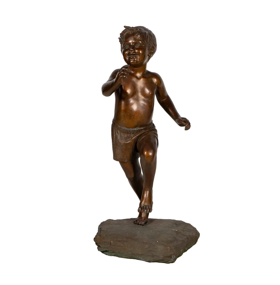 A Bronze Figure of a Boy