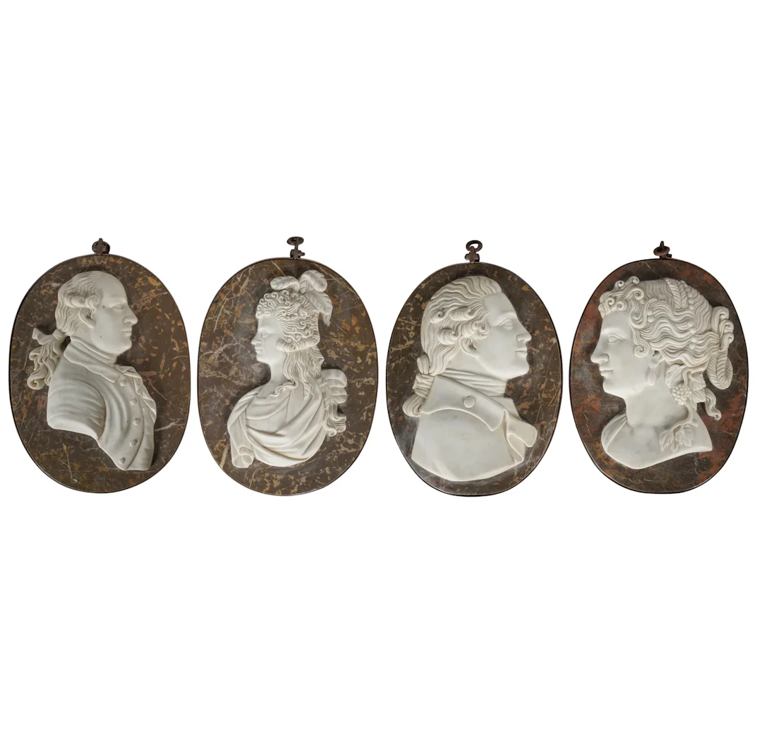 A Set of Four Italian Marble Portrait Plaques