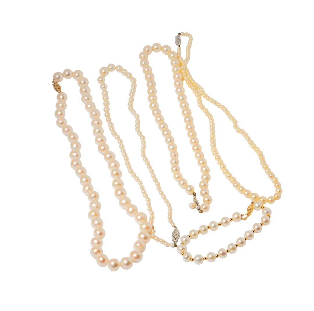 Group of Four Gold and Pearl Necklaces with a Pearl Bracelet
