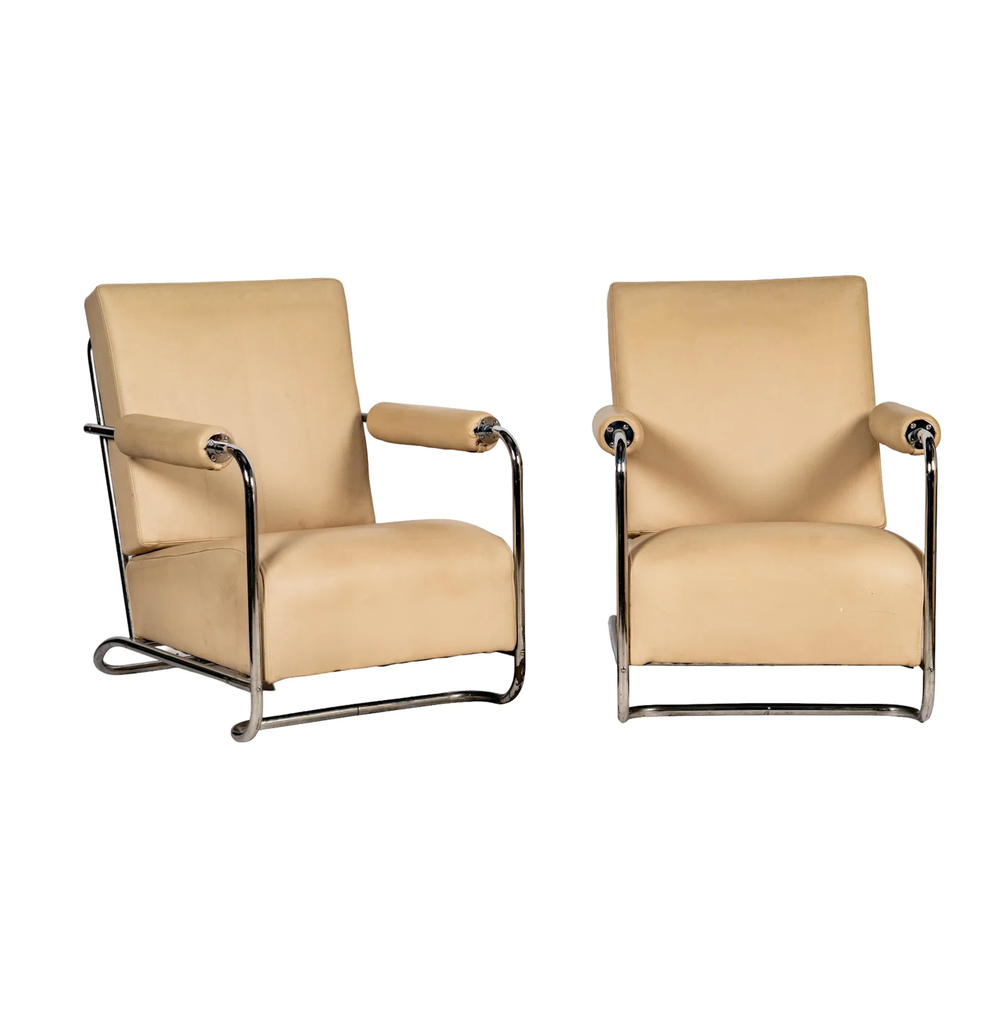 A Pair of Gilbert Rohde Art Deco Chrome and Leather Lounge Chairs