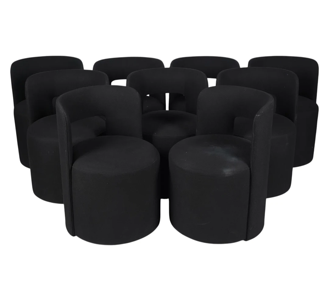 A Set of Restoration Hardware Black Upholstered Barrel Dining Chairs