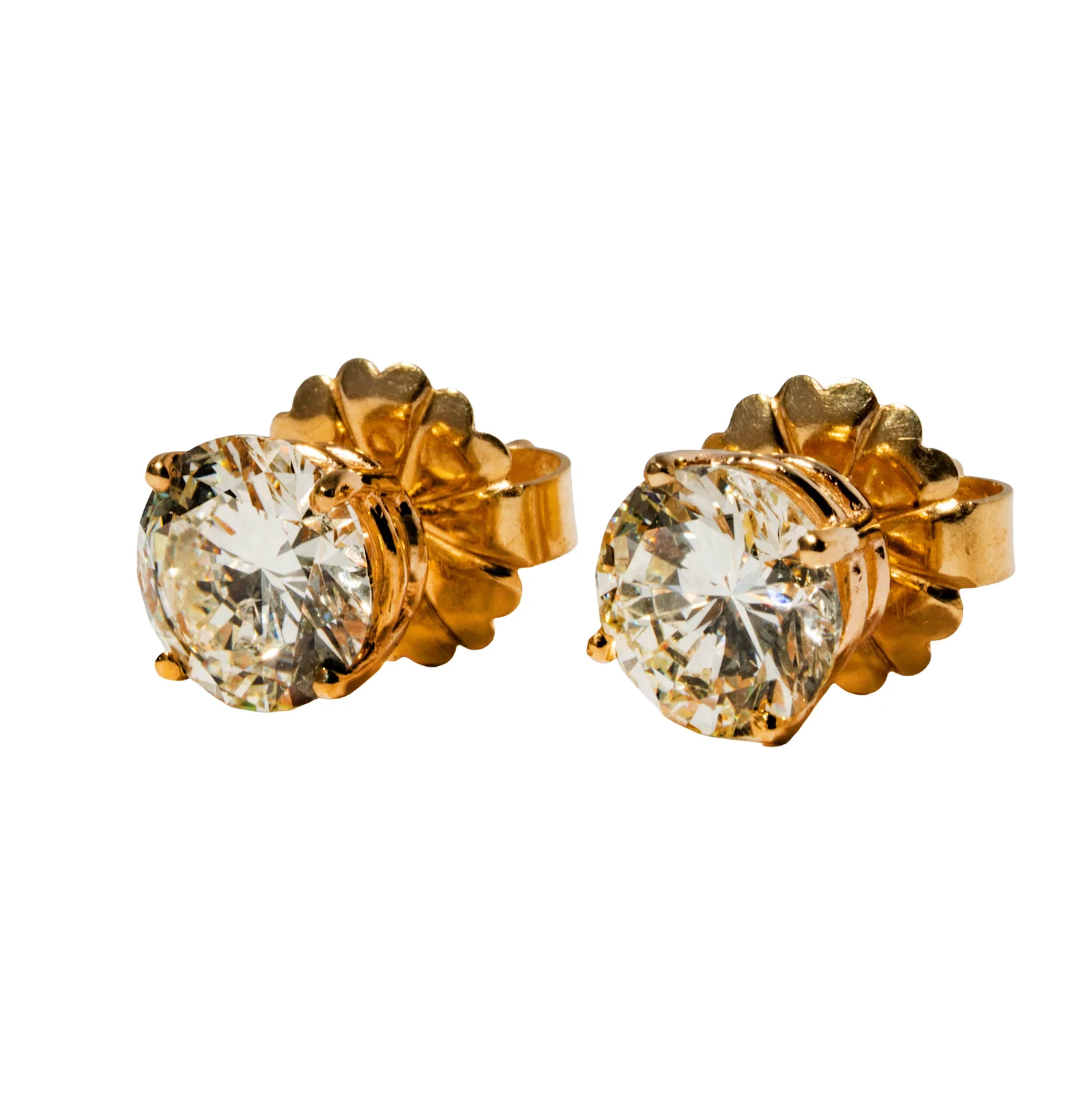 Pair of 14 Karat Diamond Earrings