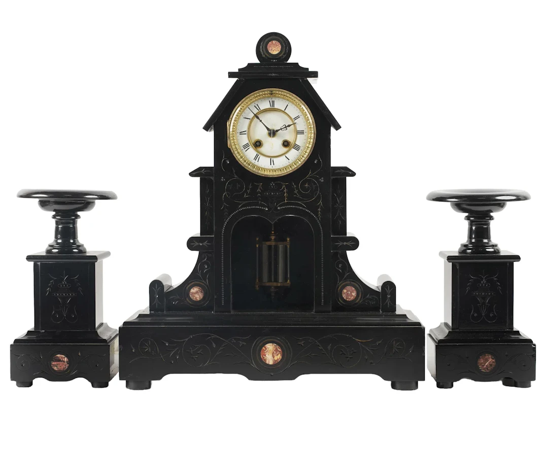 A Mid-Victorian Black Marble Mantle Clock Set