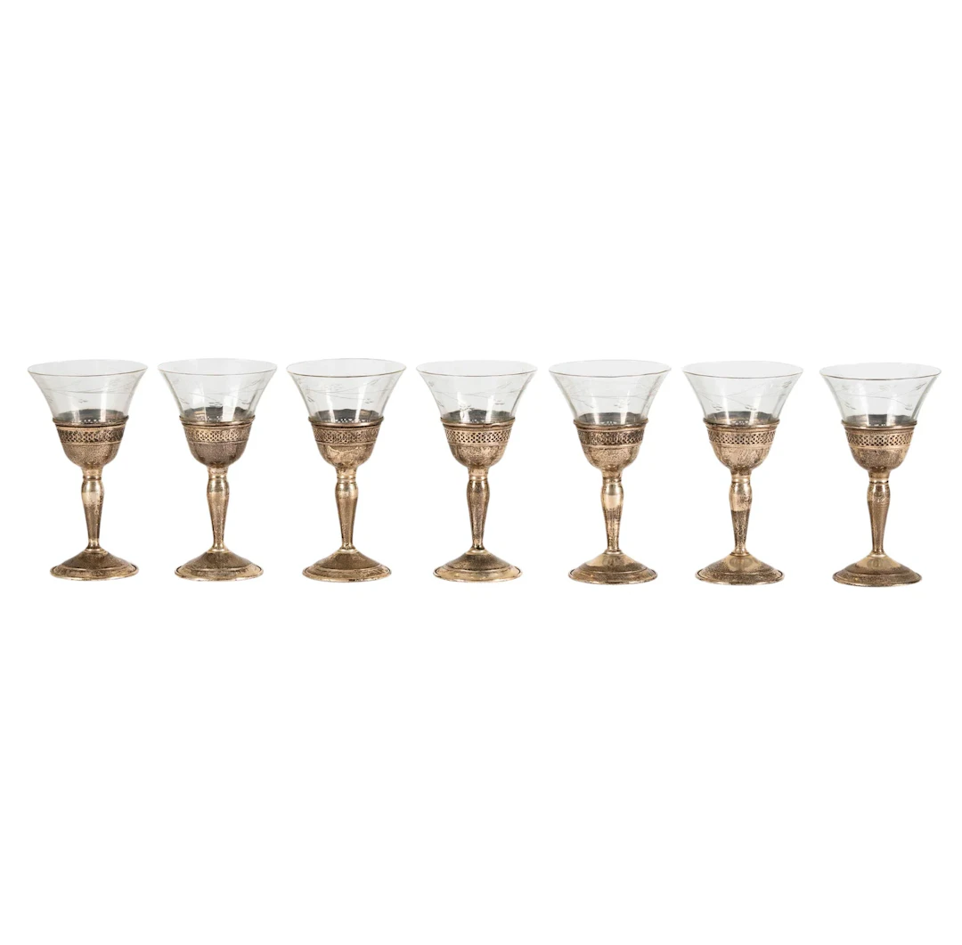 Seven Sterling and Glass Goblets