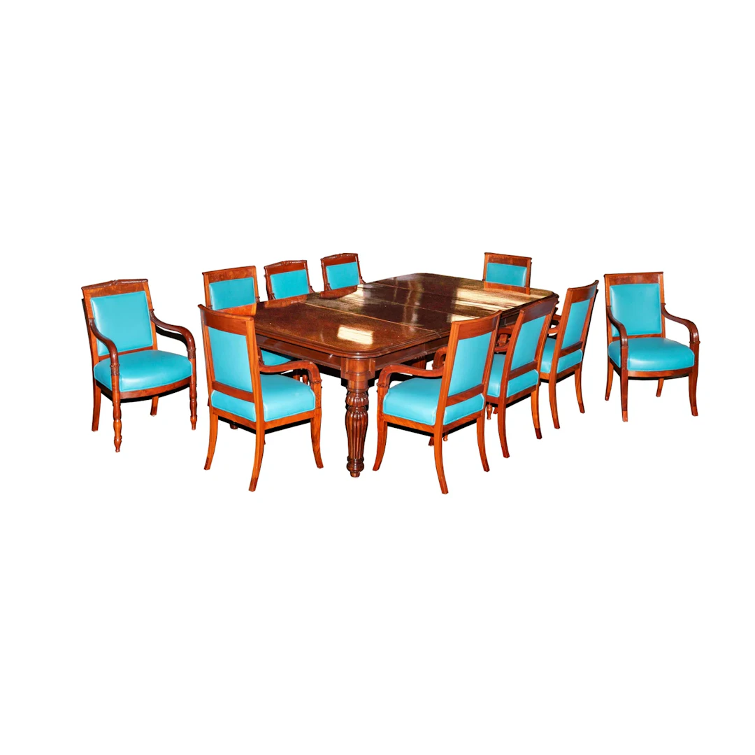 A Dining Table and a Set of Ten Empire-Style Dining Chairs
