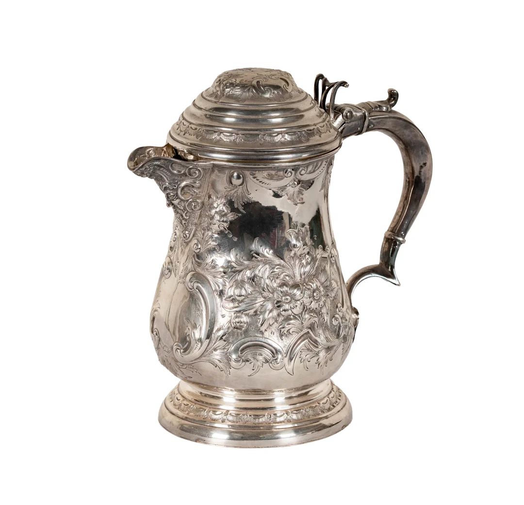 A Fondar Sterling Silver Repousse Covered Pitcher