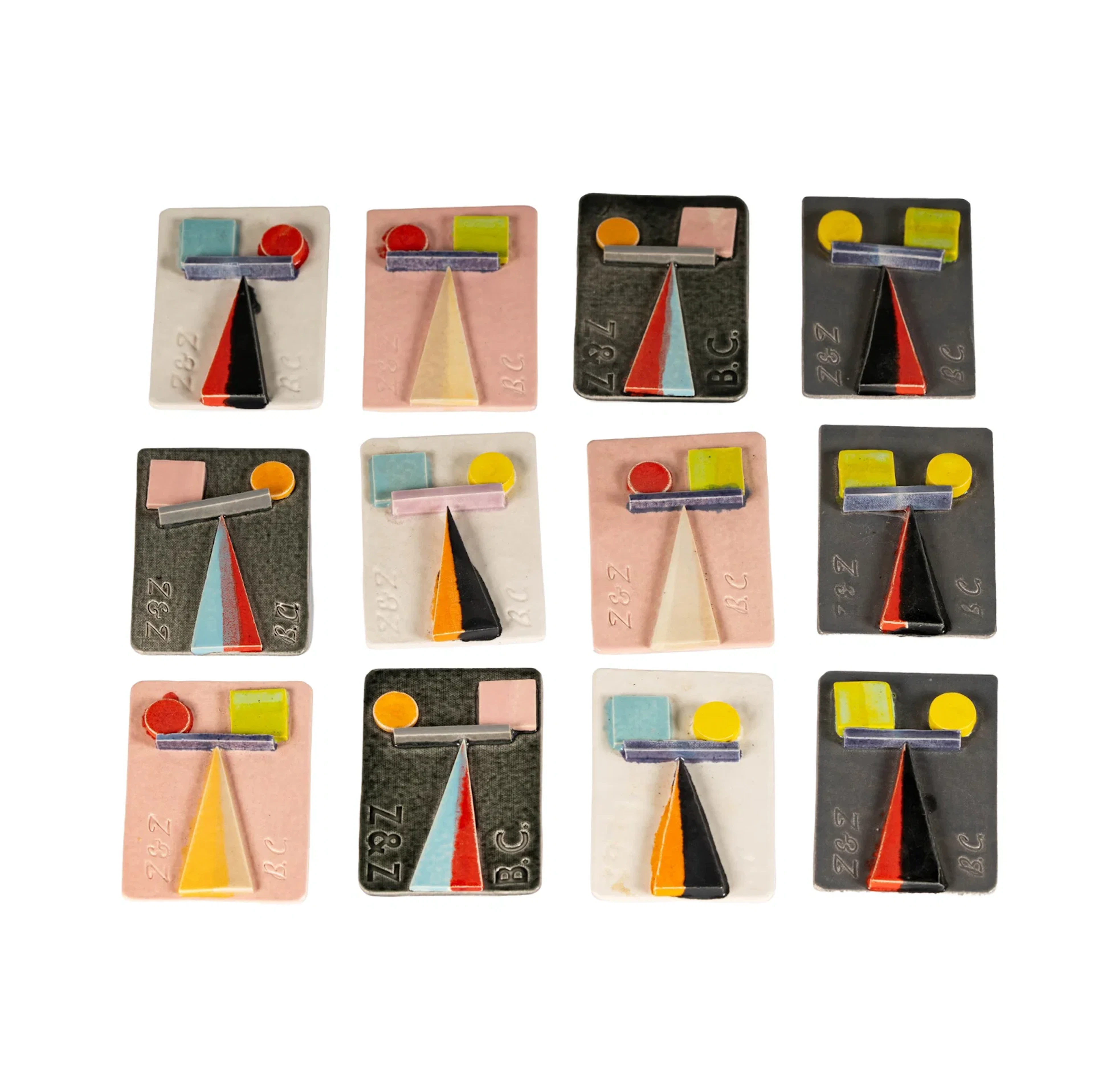 A Group of Twelve Pins