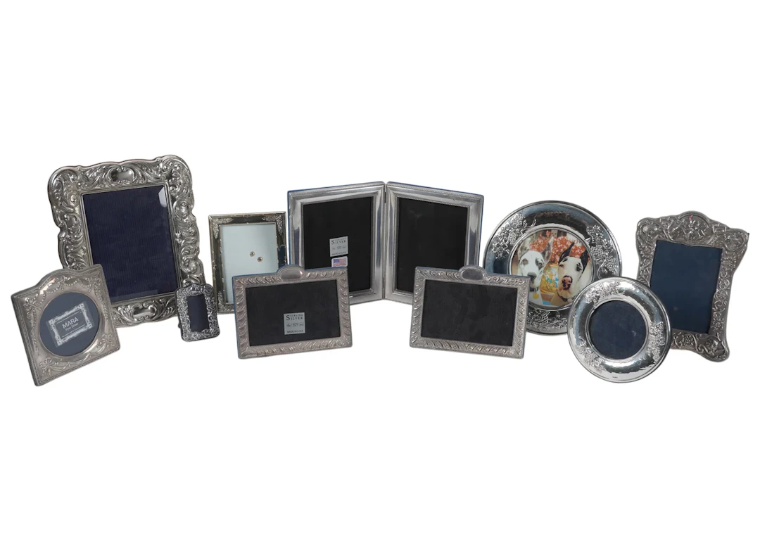 A Collection of Sterling Silver Picture Frames