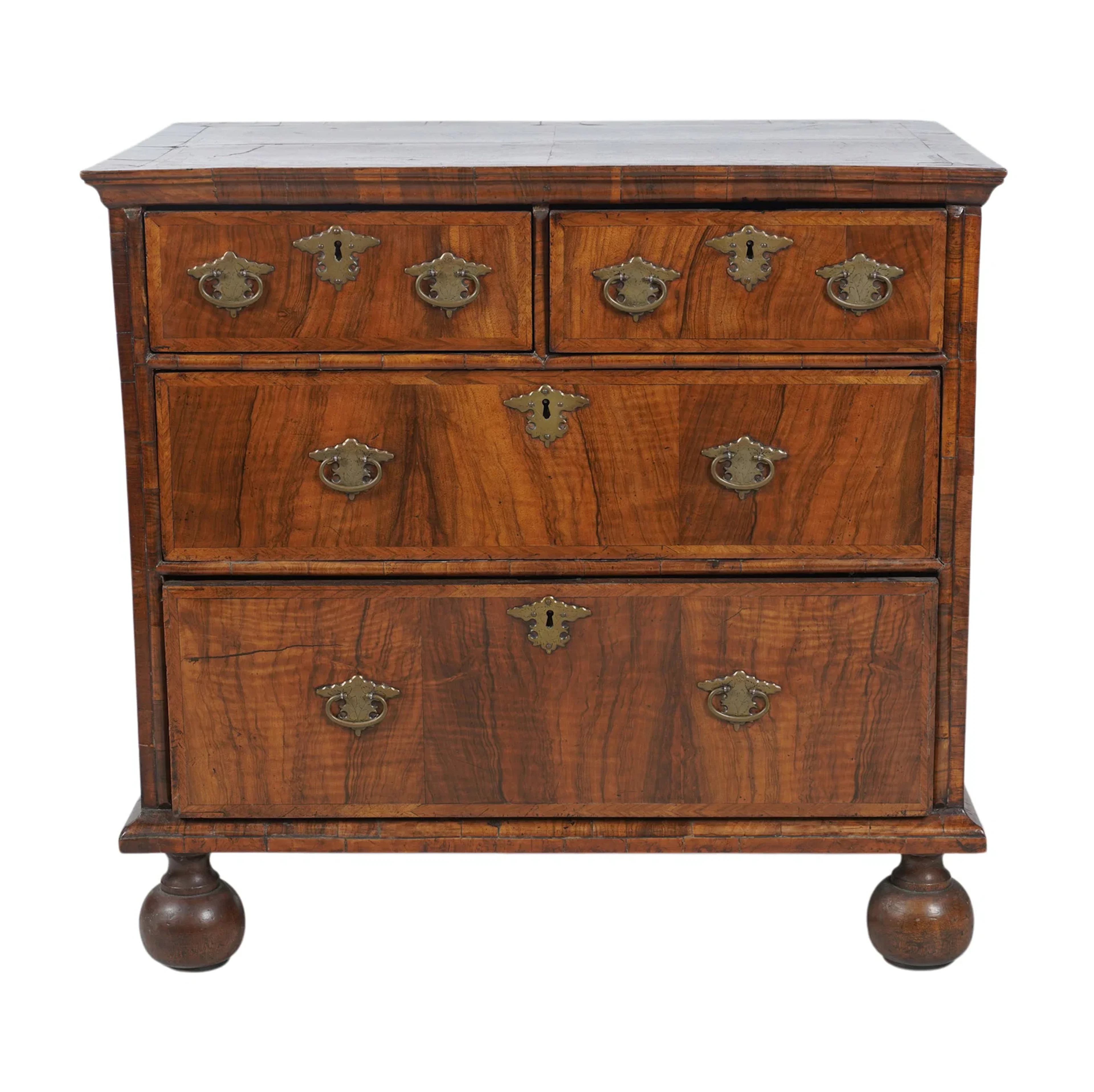 A Georgian Walnut Veneer Chest of Drawers