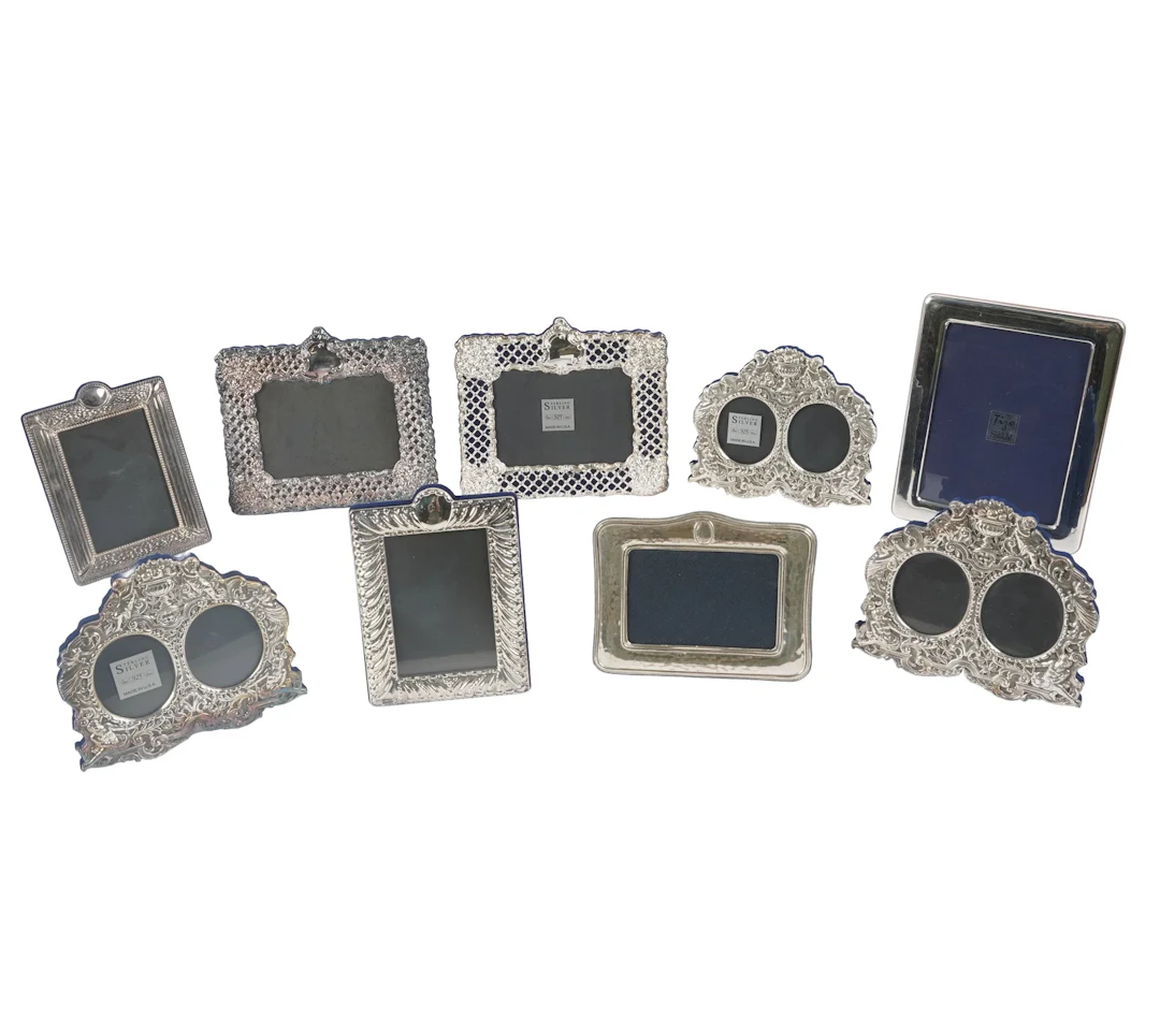 A Collection of Nine Sterling Silver Picture Frames