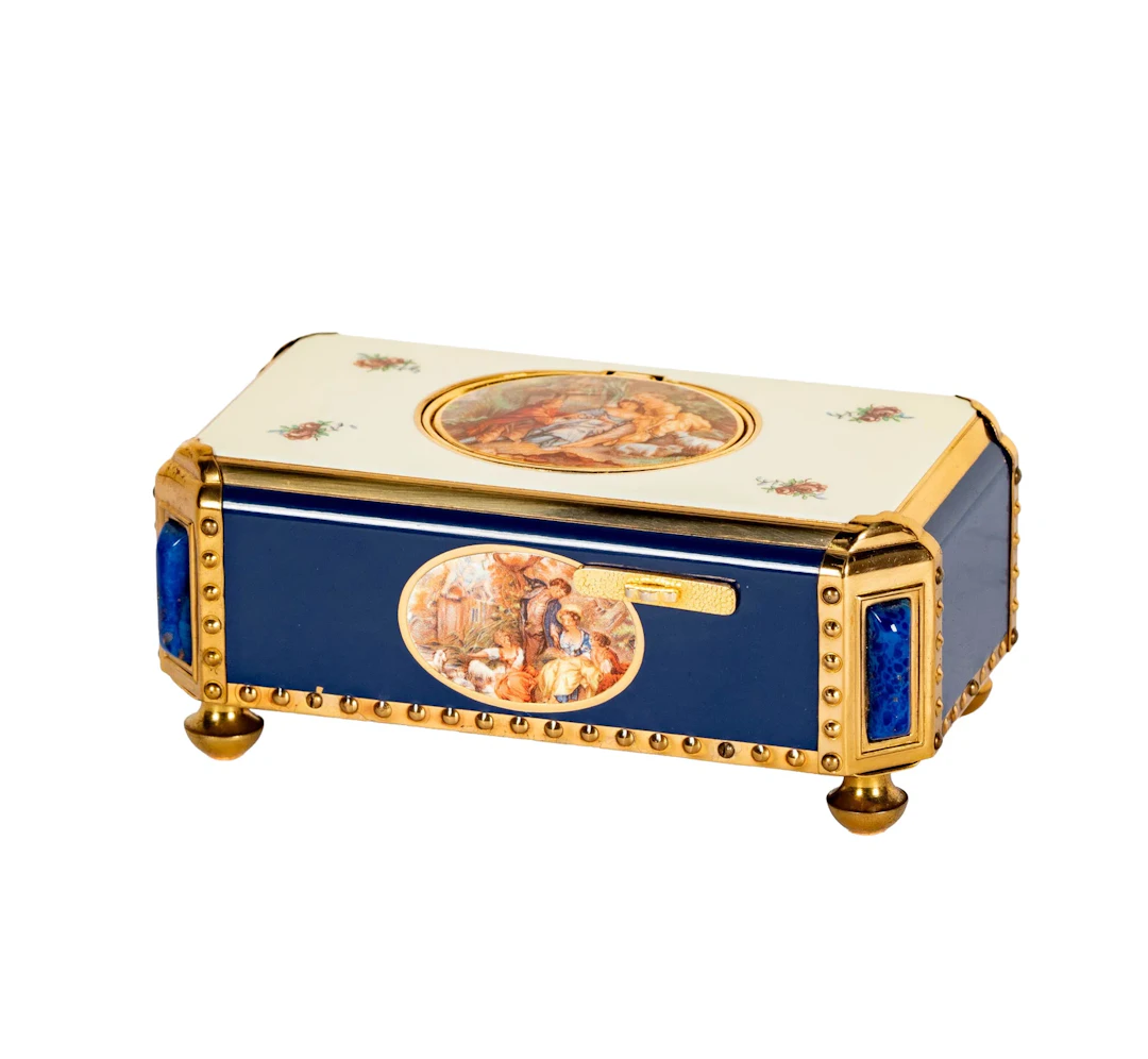 A Reuge German Porcelain Singing Bird Box