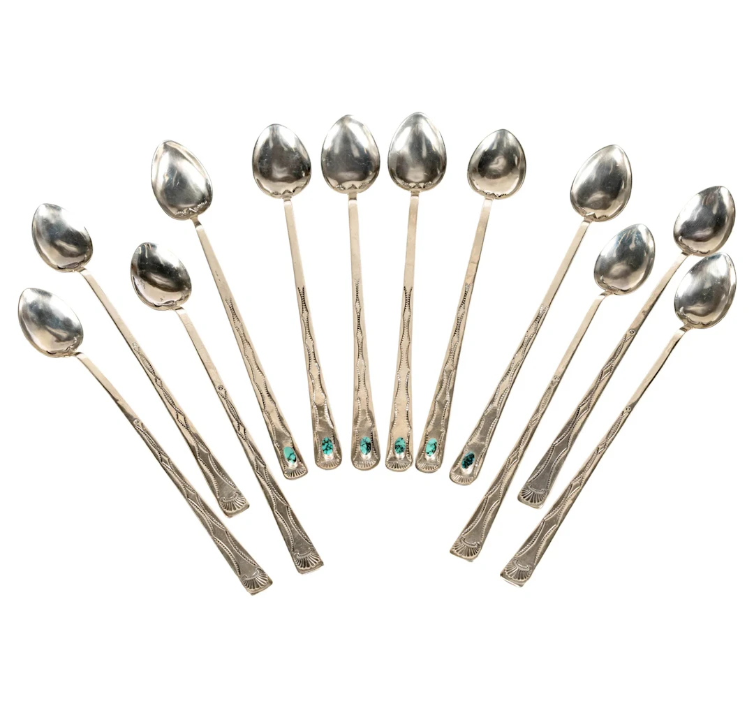 A Set of Twelve Navajo Sterling Silver Iced Tea Spoons