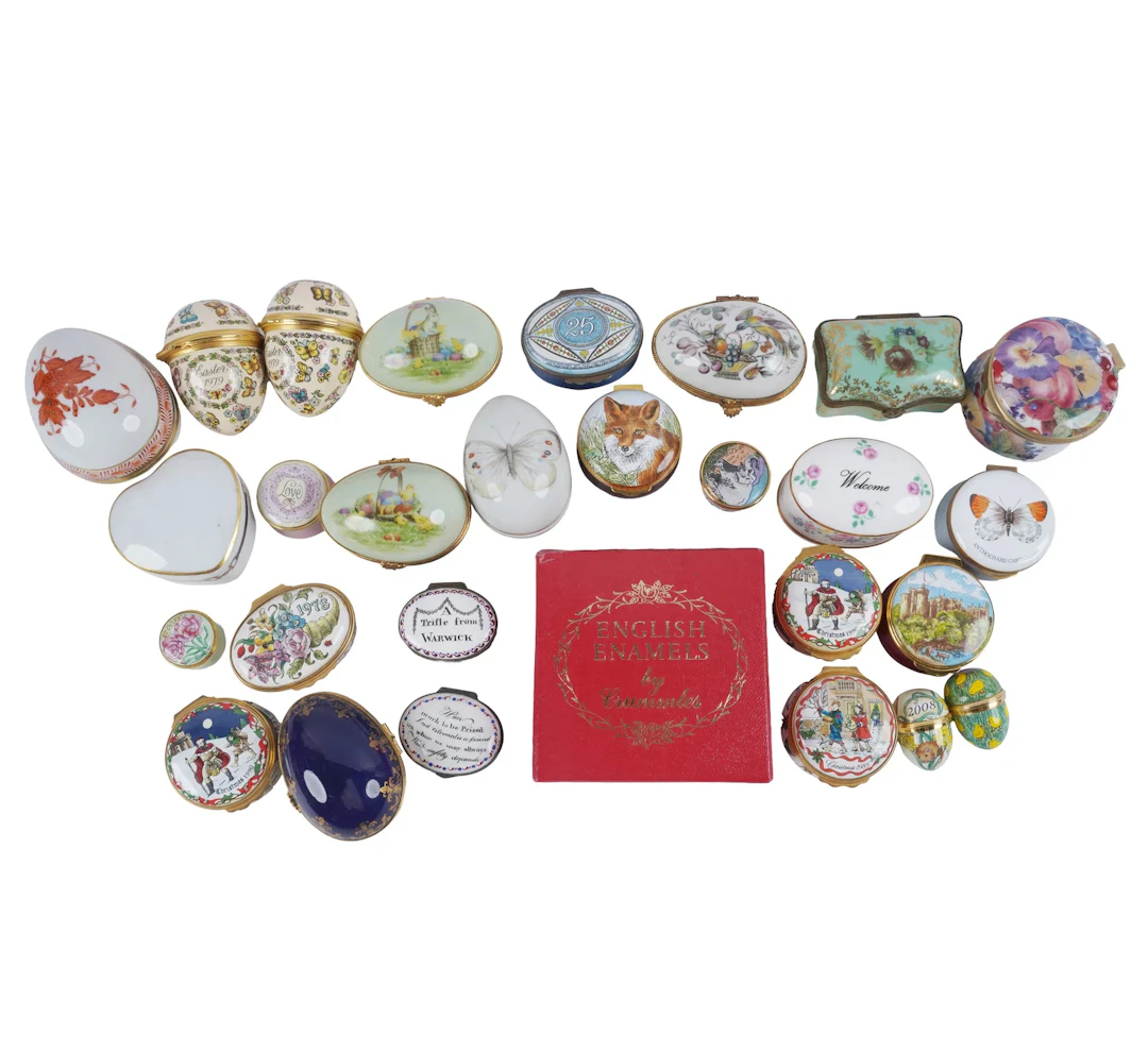 A Collection of Enamel and Porcelain Covered Boxes