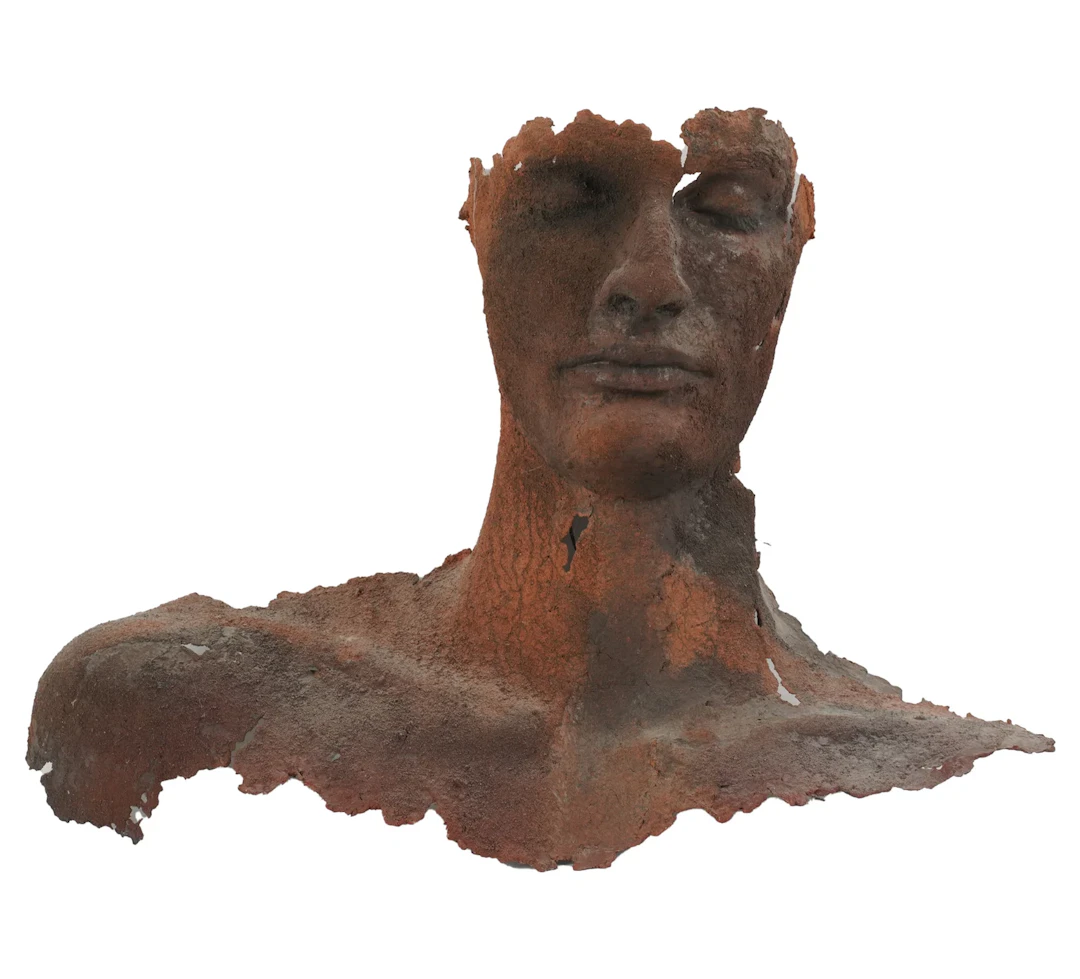 A Figural Male Wall Sculpture